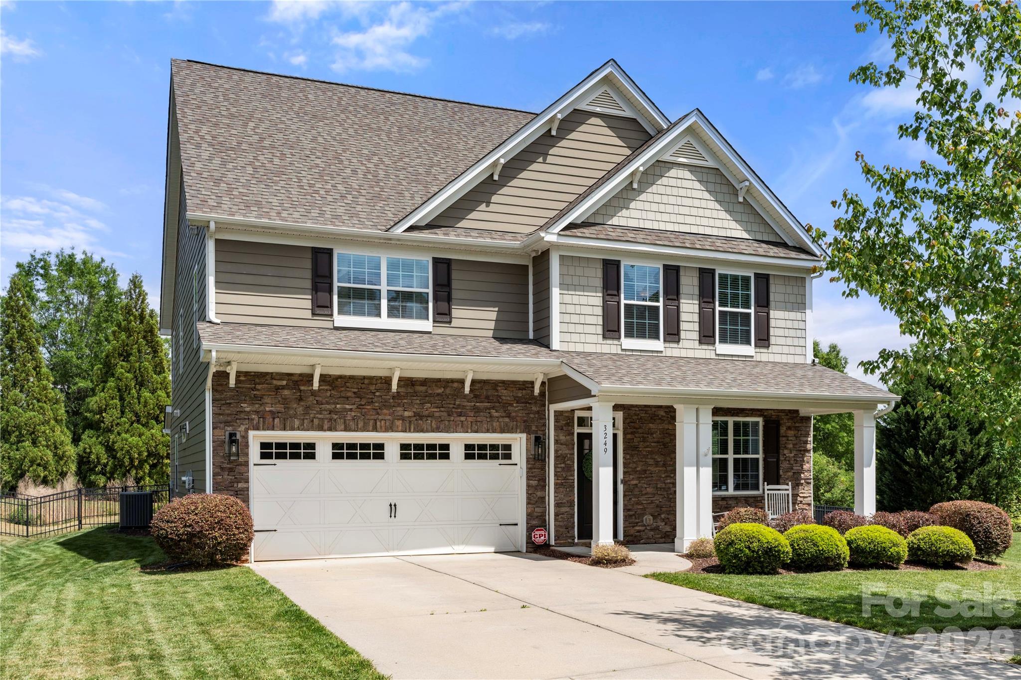 Tucked away on a cul-de-sac in The Vineyards on Lake Wylie, this beautiful home is a must-see. A covered front porch welcomes you inside, where you’ll find a formal dining area perfect for entertaining. The kitchen features granite countertops, stainless steel appliances including a double wall oven, and a bar-top seating area for casual dining. The kitchen flows into the breakfast nook and living room with a gas fireplace, offering direct access to the back patio and fully fenced backyard. The main level also includes a guest bedroom and full bath, ideal for visitors or multigenerational living. 

Upstairs, the primary suite showcases a tray ceiling, separate sitting area, and a walk-in closet. The ensuite bath offers a walk-in shower, soaking tub and double vanity. Two additional bedrooms share a Jack-and-Jill bath, while a fourth bedroom on this level has access to another full bath. A conveniently located laundry room completes the second level.

The third floor offers a versatile bonus room with a walk-in closet, full bathroom & Queen size murphy bed, perfect for a media room, home office, gym, or guest retreat.

Additional highlights include a new roof installed in 2024, 2 new HVAC units replaced in 2023 & 2024 and new hardwoods installed in 2021. Residents of this community enjoy a number of amenities including two pools, a new clubhouse, playground, kayak storage, sport courts, bocce ball, picnic areas, and lake access. This community also has a community boat ramp and a boat/RV storage lot. Spectrum internet, cable & a few streaming services are also included in the HOA dues.

Don’t miss the opportunity to make this incredible property your next home.