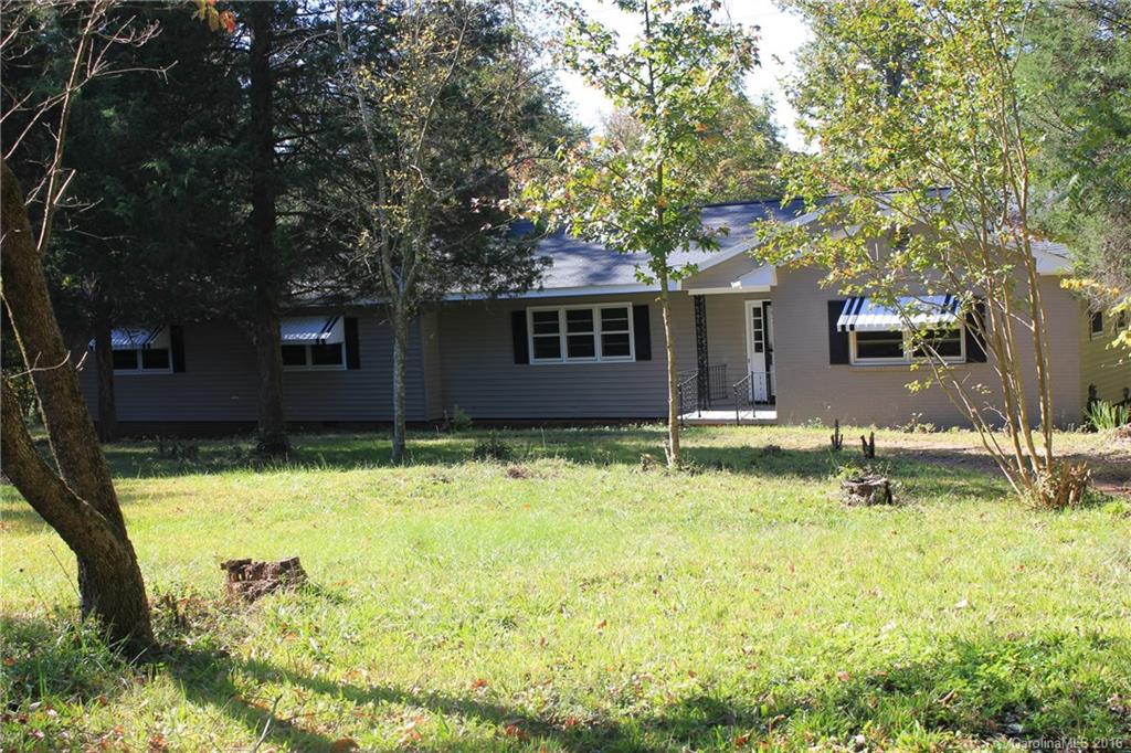 Beautiful home nestled on over two acres. Updated kitchen has tiled floors, a large laundry room. This home has four bedrooms, two full bathrooms, hardwood floors. The bathrooms include tiled floors, new lighting, mirrors and vanities. Close to shopping with an exit right off I-485, no HOA!