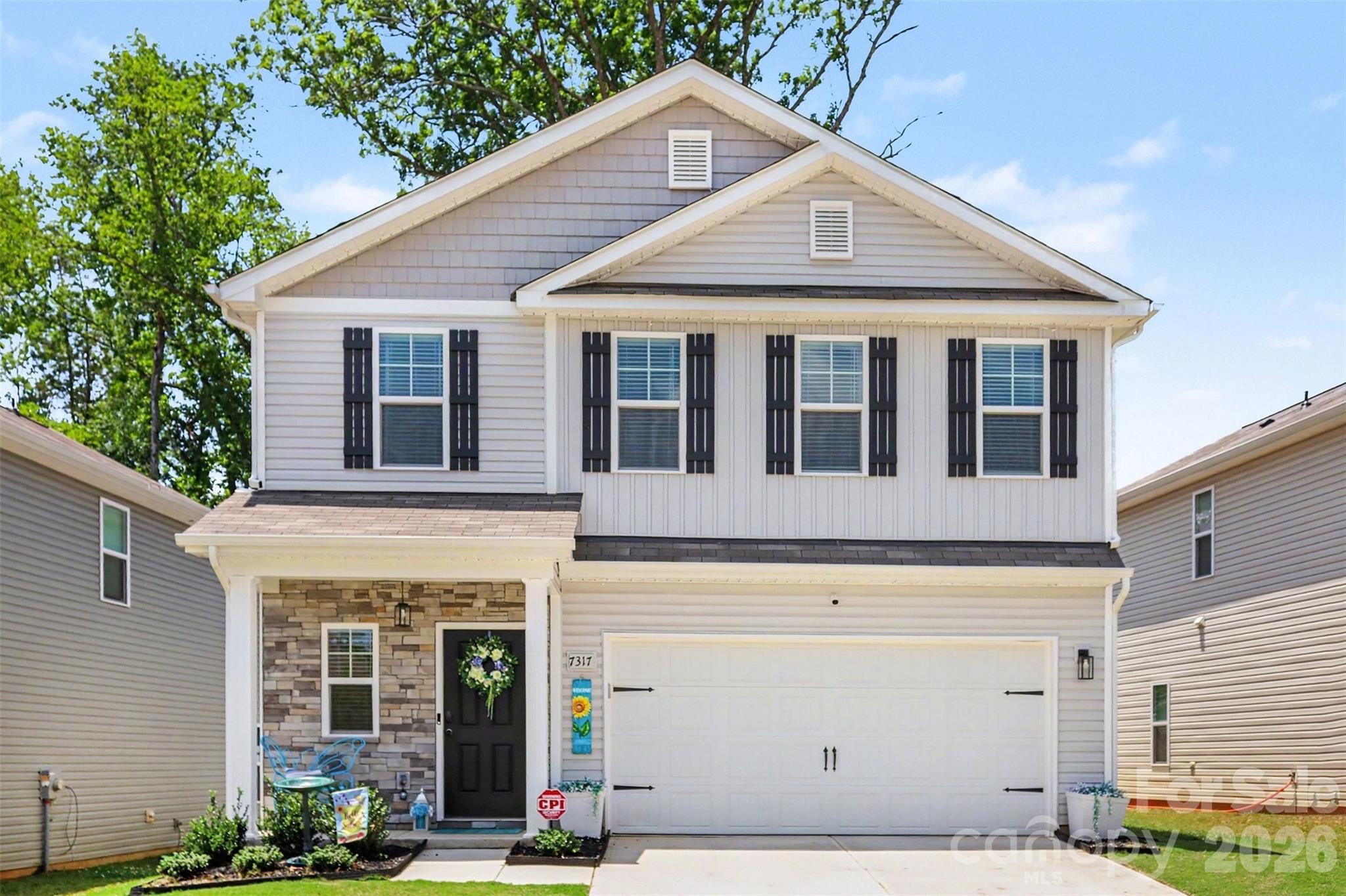 Welcome to this beautifully maintained residence in the sought-after Stoneygreen community, where modern design, premium upgrades, and everyday functionality come together seamlessly. This home shows like a model home and showcases high-end finishes throughout and an open-concept floor plan filled with abundant natural light, creating the perfect setting for both entertaining and comfortable daily living. The chef-inspired kitchen overlooks the spacious living and dining areas, anchored by a cozy fireplace and enhanced by built-in cabinetry that adds both style and functionality.
Upstairs, the generously sized primary suite offers a peaceful retreat with a spa-inspired bath and walk-in closet, while the additional bedrooms provide flexibility for family, guests, or a home office. One of the secondary bedrooms has been thoughtfully transformed into an impressive custom walk-in closet, providing exceptional storage while offering the flexibility to be easily converted back into a fourth bedroom if desired. A convenient second-floor laundry room and ample storage throughout add to the home's functional appeal.  
Step outside to enjoy the fully fenced backyard and patio, perfect for relaxing, entertaining, or letting pets play. The home is equipped with app-controlled exterior holiday lighting, allowing you to celebrate every season with customizable colors at the touch of a button. An alarm system also conveys with the home, providing added peace of mind.
Residents of Stoneygreen enjoy neighborhood sidewalks, green spaces, and a welcoming community atmosphere, all while being conveniently located near I-485, Reedy Creek Nature Preserve, UNC Charlotte, and an abundance of shopping, dining, and entertainment. Combining designer finishes, thoughtful upgrades, and an unbeatable location, this move-in-ready home truly shows like a model and is one you won't want to miss.