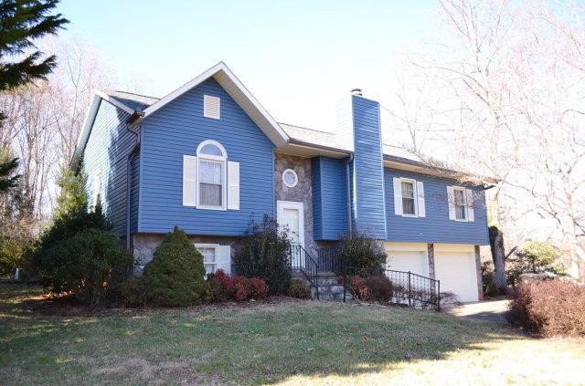 Excellent location! Wonderful 4BR/2BA updated home with fenced in-ground pool in Hermitage East Subdivision, located just between Morganton and Valdese. New in 2014: architectural roof; gutters; siding and pool pump. New heat pump installed in 2013. Spacious open living, dining and kitchen featuring vaulted ceilings. Living room features wood burning stone fireplace and has been freshly painted. Screened porch opens from kitchen/dining and leads to in-ground, fenced pool in private back yard. Split bedroom plan features two large bedrooms sharing a full bath with shower/tub combination in hallway. Gracious master suite features vaulted ceilings, large walk-in closet and full bath with shower/tub combination. Fourth bedroom, additional storage room/office on lower level. Lower level also has 1/2 bath not counted in heated square feet. Double car garage. Numerous decorative perennials, shrubs and trees provide a colorful display in spring/summer. Outbuilding.