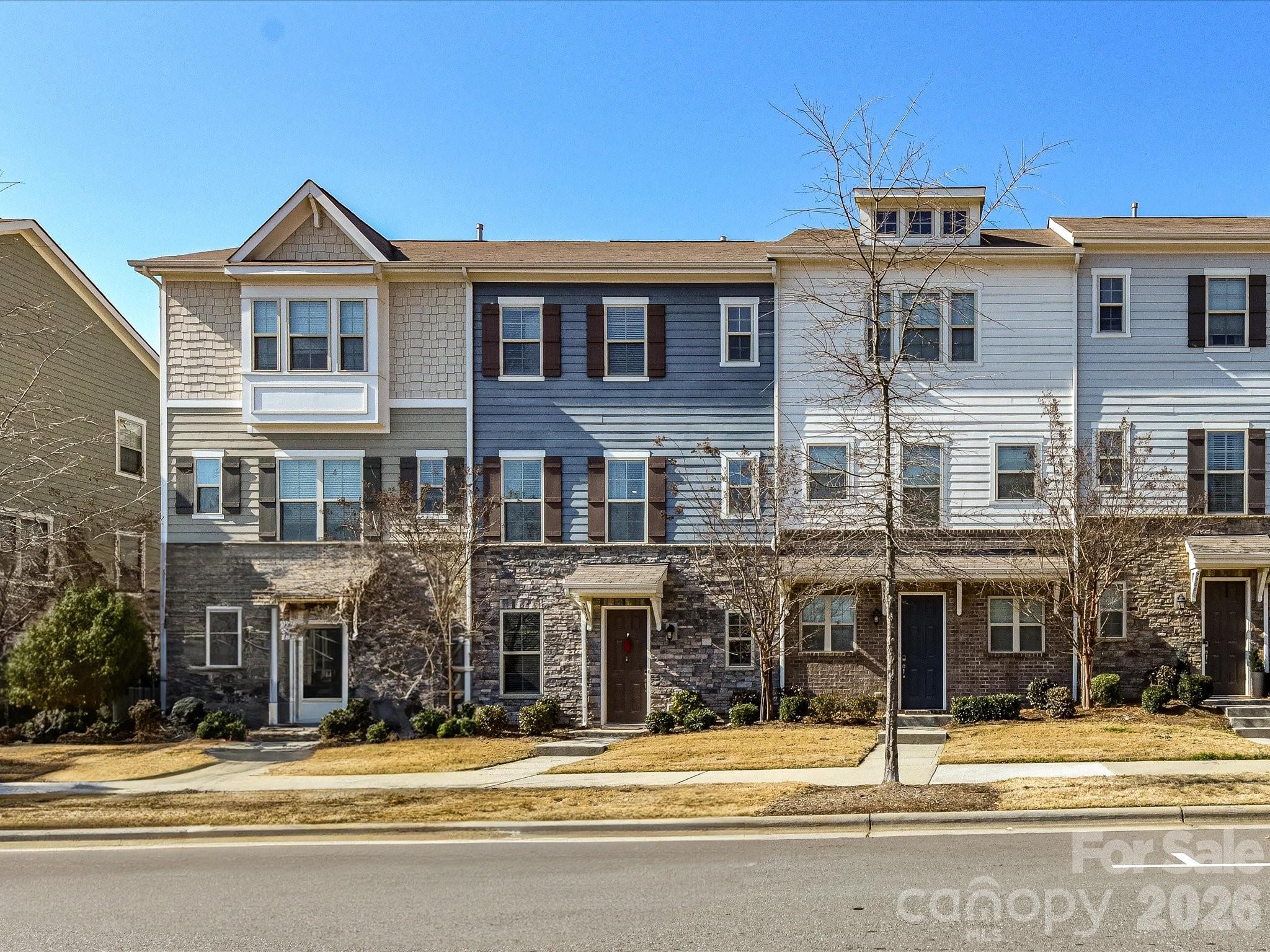 Back on the market at no fault of the sellers. Enjoy low-maintenance living in this three-story townhome with 2 bedroom suites, 2.5 baths, a flexible home office, and a 2-car attached garage with upgraded epoxy flooring. Designed for easy living, the open-concept main level features an island kitchen with 42" white cabinetry, granite countertops, tile backsplash, stainless steel appliances including a gas range with double ovens, microwave, and walk-in pantry. The kitchen opens to the dining area and great room, creating a comfortable, functional layout.

Community amenities include a resort-style pool with sun shelf, gas grills, cabanas, changing rooms, landscaping & exterior maintenance, as well as dog bag stations. Conveniently located near Arrowood light rail Station, major roadways, shopping and dining. 

Community does have a rental cap that has been met and there is a waitlist.