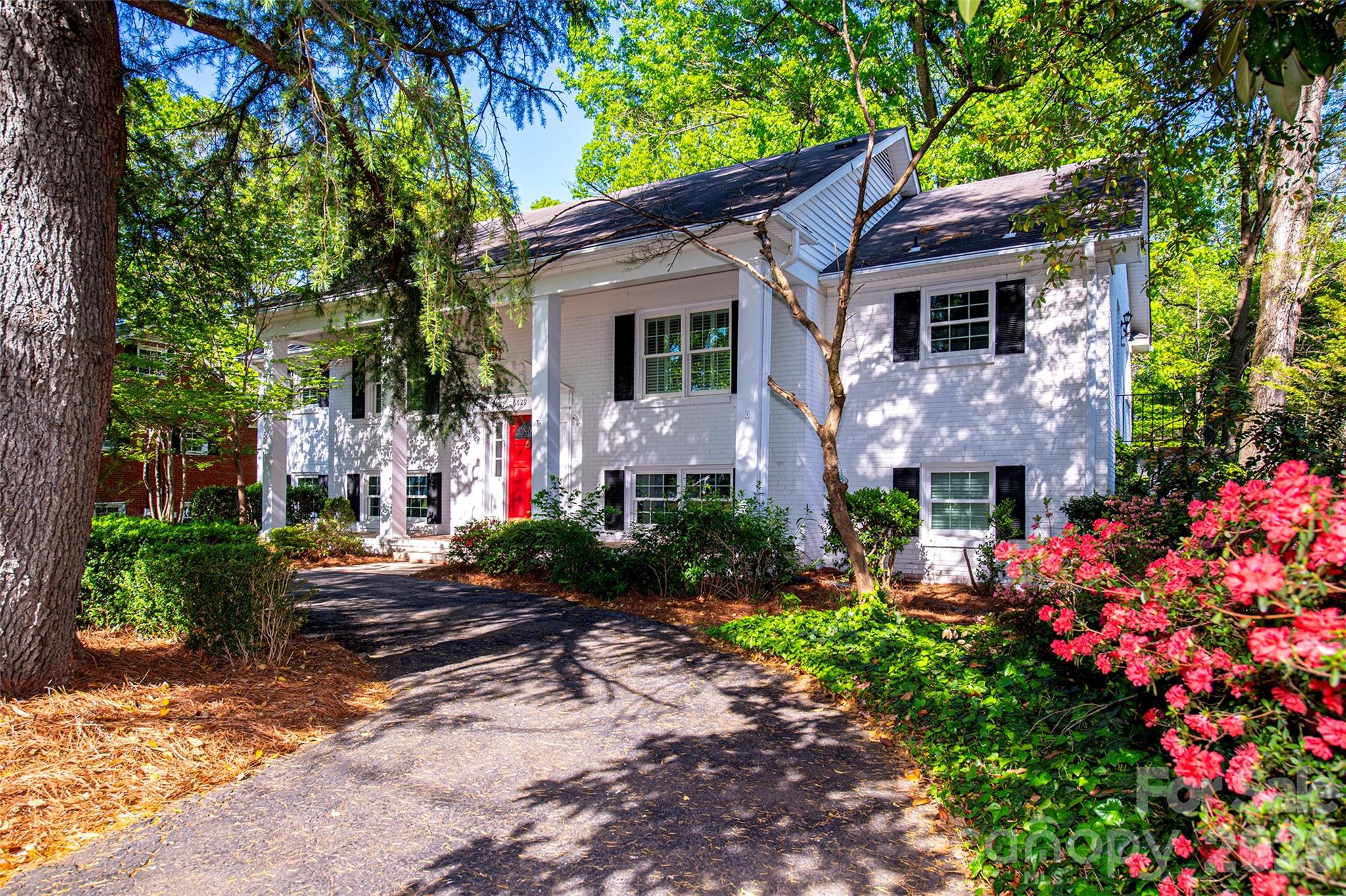 Located in the highly desirable Olde Providence neighborhood, this beautifully updated home offers over 3,000 sq ft of living space with 6 bedrooms and 3 full baths. Freshly painted throughout, the home features abundant natural light, hardwood floors, and two fireplaces that add warmth and charm. The spacious lower-level great room includes a bar area with a kegerator, perfect for entertaining. Step outside to a thoughtfully designed outdoor retreat with a patio featuring a gas/wood firepit and a flowing fountain, plus a charming gazebo—ideal for relaxing or hosting guests. The beautifully landscaped yard is filled with flowering bushes and offers exceptional privacy, backing to peaceful woods and a creek. A rare opportunity combining space, storage, updates and a serene natural setting in one of Charlotte’s most convenient locations. Ideally located just minutes from the shops at Colony Place, offering popular dining, Harris Teeter Grocery, and everyday amenities. Olde Providence is home to the Windyrush Swim & Tennis Club, where voluntary memberships are available.