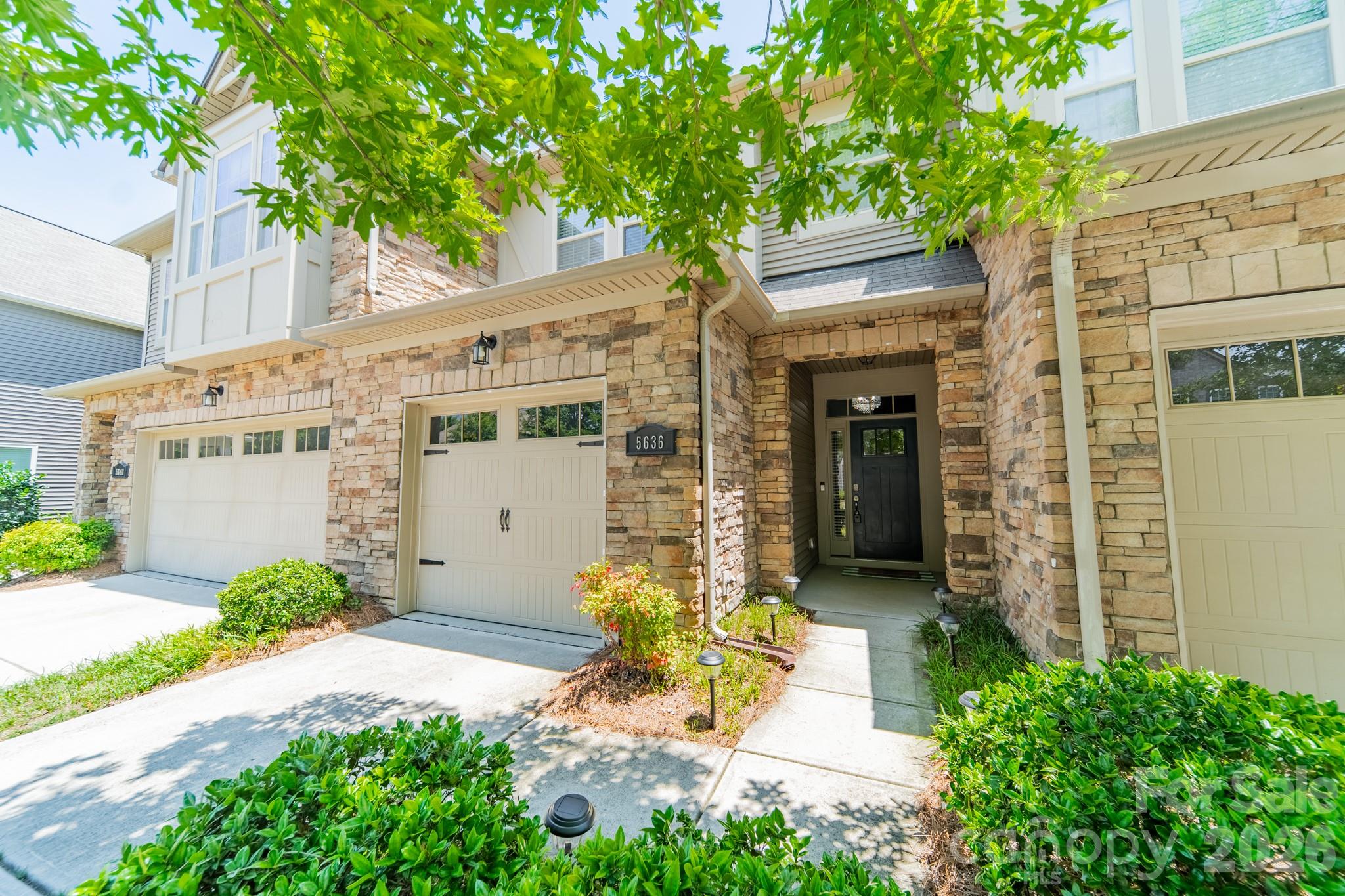 Welcome to Stonehaven at Berewick, where convenience and low-maintenance living come together in one of southwest Charlotte's most accessible locations. This well-maintained townhome offers 3 bedrooms, 2.5 baths, and 1,577 square feet of thoughtfully designed living space. The open floor plan creates seamless flow between the living, dining, and kitchen areas, providing flexibility for everyday living and entertaining. Upstairs, you'll find three bedrooms, two full bathrooms, and a conveniently located laundry room. Step outside to enjoy the private rear patio—an ideal space for relaxing, grilling, or enjoying your morning coffee. Located just around the corner from the world-class amenity center including: Club House, Dog Park, Outdoor Pool, Playground, Pond, Sport Court and Walking Trails!  A one-car garage provides added convenience and storage. Located within walking distance of Charlotte Premium Outlets, restaurants, and everyday conveniences, this residence offers exceptional access to Interstate 485, Charlotte Douglas International Airport, and Uptown Charlotte. Whether seeking a primary residence, a first home, or a low-maintenance lock-and-leave lifestyle, this home delivers an ideal combination of location, functionality, and accessibility. Welcome Home!