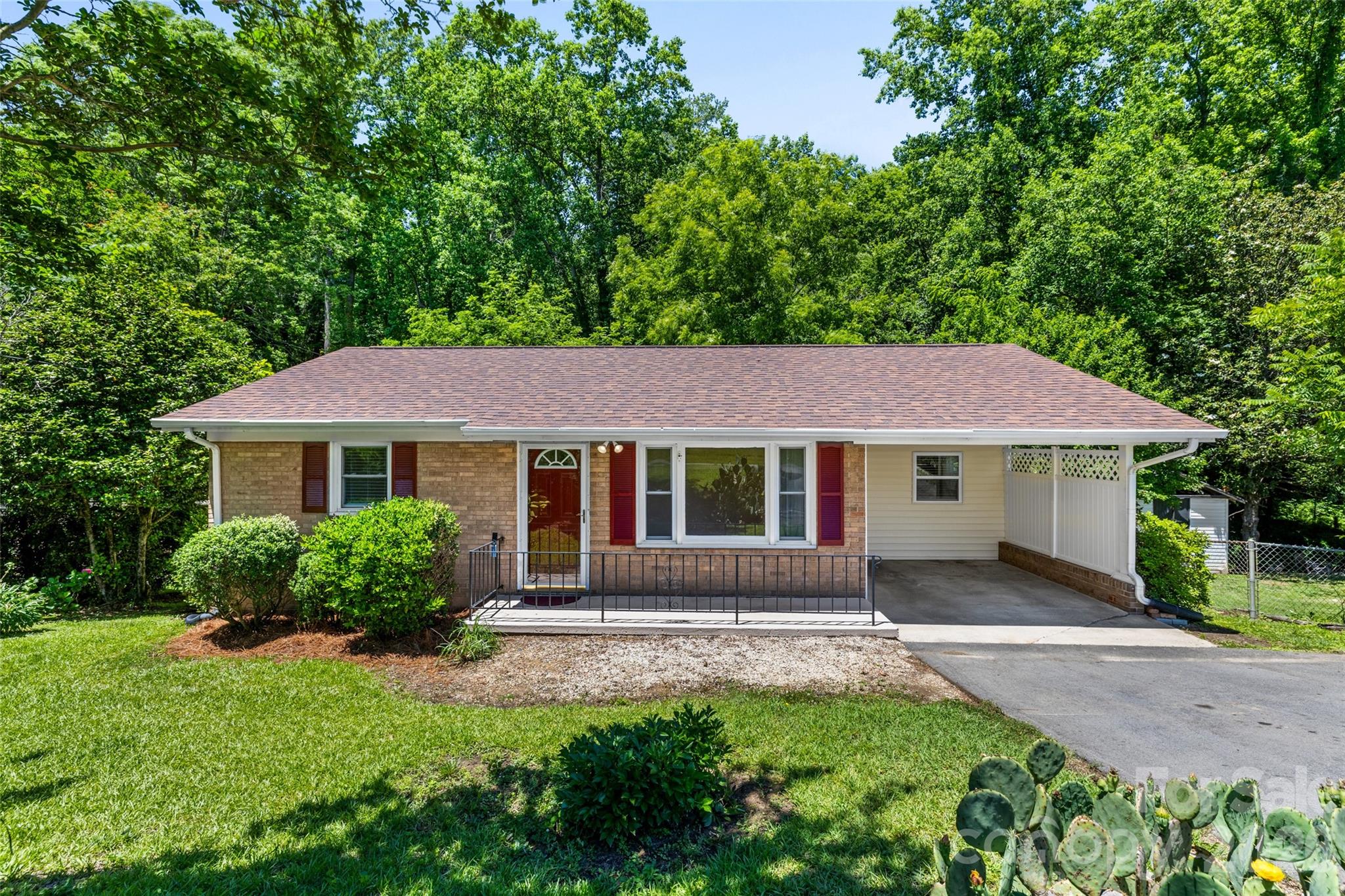 Welcome to 219 Belton Avenue, Mount Holly, NC — the perfect place to start your homeownership journey! This beautifully remodeled home combines classic charm with modern updates, making it an ideal choice for first-time buyers seeking a move-in-ready property with major improvements already completed.Relax and unwind on the inviting rocking chair front porch before stepping inside to discover freshly painted interiors and beautifully refinished hardwood floors that add warmth and character throughout the home. The updated kitchen features stunning quartz countertops, providing both style and functionality for everyday living and entertaining. The remodeled bathroom offers a fresh, modern feel with updated finishes you'll appreciate from day one.Beyond the cosmetic updates, this home offers peace of mind with an architectural shingle roof that is approximately eight years old and an HVAC system replaced in 2021. Outside, you'll love the convenience of the attached carport, providing covered parking and protection from the elements year-round.One of the home's standout features is the beautiful rear deck overlooking a peaceful, wooded backyard—an ideal setting for morning coffee, weekend cookouts, or simply unwinding while enjoying the privacy and natural surroundings. The backyard offers a serene retreat with plenty of space to enjoy nature right at home.Whether you're hosting friends and family or enjoying a quiet evening at home, this property offers the perfect blend of comfort, charm, and convenience. Best of all, there is no HOA, giving you the freedom to enjoy your property without additional restrictions or dues.Conveniently located just minutes from downtown Mount Holly, shopping, dining, parks, and major commuting routes, 219 Belton Avenue provides exceptional value and an opportunity to build equity instead of paying rent.Move-in ready and loaded with updates, 219 Belton Avenue is the perfect place to call home.