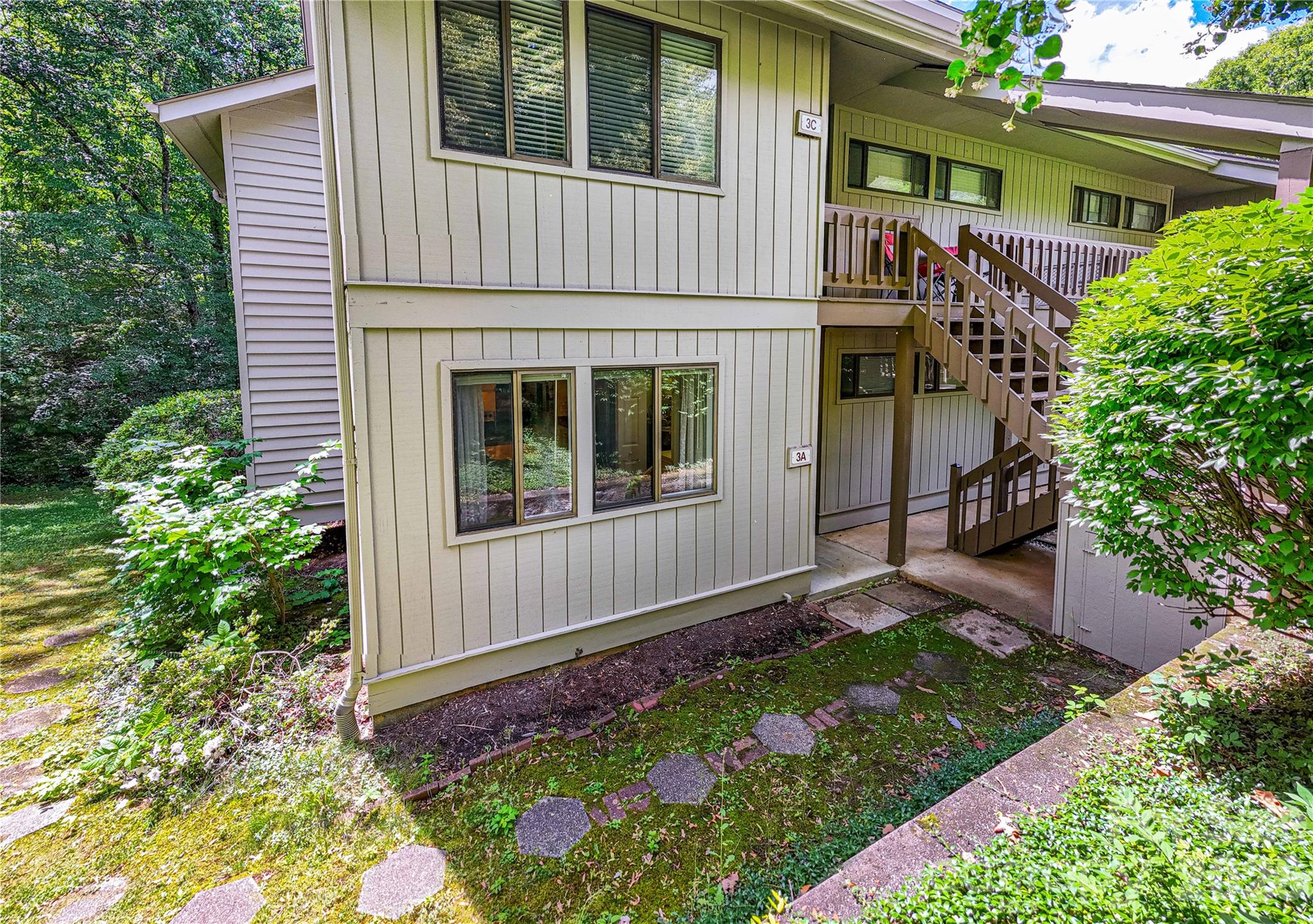 Grab this Cedarwood condo quick; units in this development very rarely come up for sale. Quiet, wooded, and supremely peaceful, yet 10 minutes parked downtown, and just 2 minutes to the Blue Ridge Parkway. With a dreamy back porch in the trees, spacious living room with fireplace, a huge basement storage area, and pool and tennis courts within easy walking distance, this 2 bedroom 2 bath unit is ideal for residents or those seeking a second home. Furnished, with washer and dryer included as well, schedule a showing at this beautiful Asheville condo and you won't be disappointed.