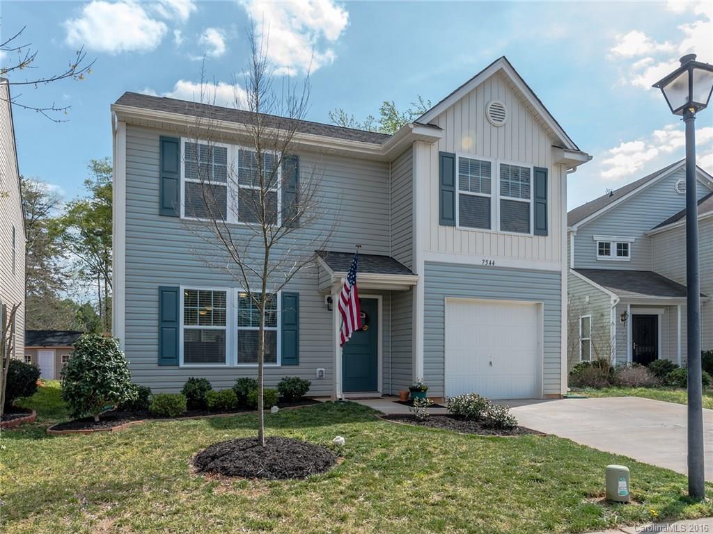 Why wait for new construction? This home is like new & has fresh paint throughout! Great open floor plan with FP in living room. Kitchen includes upgraded stacked cabinets, kitchen island with breakfast bar, gas range & black appliances. Nice sized dining room located right off the kitchen. Upstairs features generously-sized bedrooms & loft. Master bedroom suite & huge walk in closet. Fully fenced backyard with private wooded lot. Carpets just cleaned. Additional parking pad. Home Warranty.