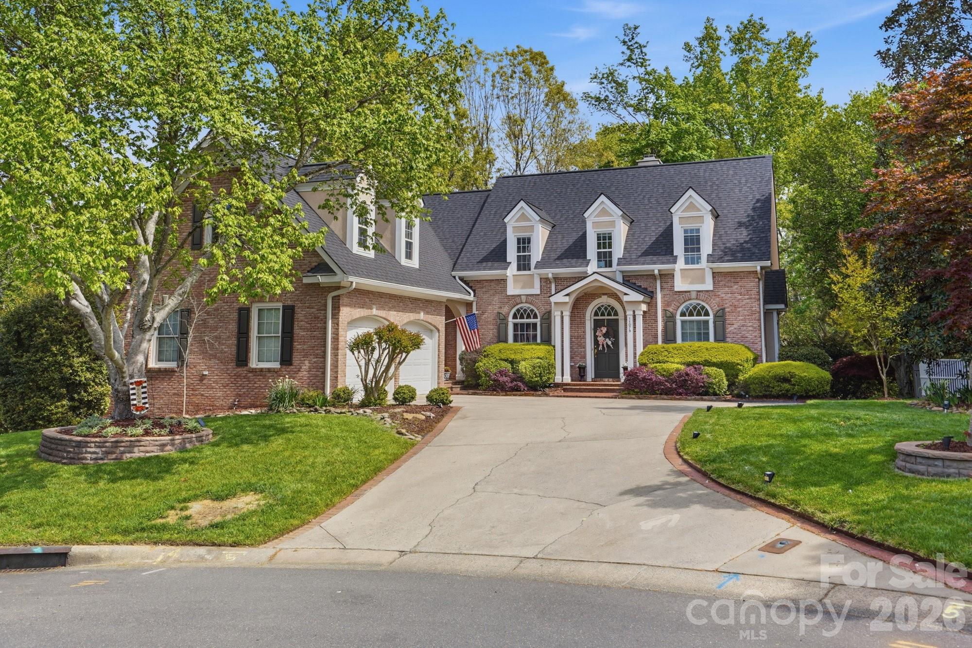 Experience waterfront living on Lake Wylie in the heart of Tega Cay—an incredibly rare find with no HOA dues and access to some of the area’s best amenities. Just minutes away, enjoy Windjammer Park, ball fields, walking trails, and an active lifestyle, all within the highly sought-after Fort Mill School District.

This stately full brick home offers timeless curb appeal with a side-load garage and a functional layout designed for everyday living. Wonderful kitchen with stainless steel appliances, open to the breakfast area & keeping room. The primary suite is conveniently located on the main level, while the upper level features a loft, two bedrooms, and two full baths. The basement level adds even more flexibility with a den, recreation area, and dedicated workshop space.

Outdoor living is where this property truly stands out. Take in peaceful lake views from the side and rear decks, offering both privacy and the perfect setting for relaxing or entertaining. Step down to the terraced lakeside area with a cozy chiminea—ideal for evenings by the water.

Enjoy direct access to Lake Wylie from your own backyard, complete with a sandy beach perfect for swimming, paddleboarding, or kayaking. (Per regulations, this lot is not eligible for a private dock.)

All of this is just a short drive to Uptown Charlotte, Charlotte Douglas International Airport, Interstates 77, 85, and 485.  Multiple area medical facilities and hospitals, and convenient access to many dining and shopping options.  Come enjoy a slower pace of life and low SC taxes. Roof was replaced in 2025, the main level HVAC replaced in 2025, main level windows replaced in 2023. Upper-level windows replaced just before they purchased the home.