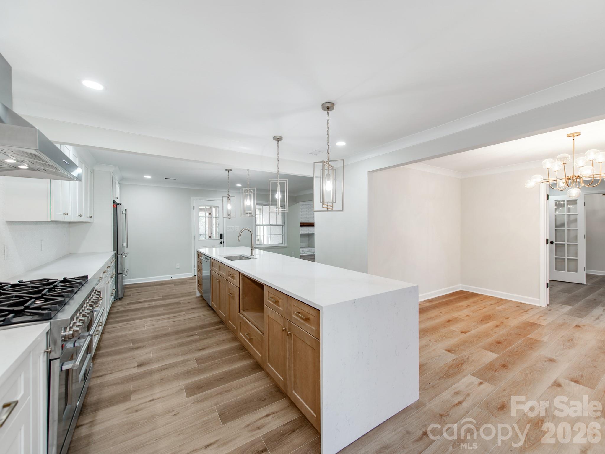 Fully Renovated Luxurious 1-story All Brick Ranch Home,  is located in one of the most Sought-After neighborhoods in South Charlotte, offering convenient access to Uptown and South Park. This Large 4,800+ sqft  home is surrounded by beautiful mature trees on a large private lot with a fenced in backyard!

Inside, the home features an open and airy layout with 4 large bedrooms, 3.5 baths, and a huge finished basement! The Home has been updated w High-end upgrades including Tile and Rare Quartz countertops in Kitchen and Bathrooms. The Chef's kitchen features High-End Gas Range & Stovetop along with a Massive Kitchen Island great for accommodating large families. The large private backyard features an enclosed screened in porch great for entertaining guests.  The Master EnSuite offers privacy and is enhanced with its spa like bathroom and walk-in closets. The Huge basement can accommodate various needs such as a game room, home theater, and additional living quarters with exterior & interior entry and exits. 

Overall, this home perfectly balances elegance, space, and functionality, making it a great find in South Charlotte’s competitive market. It promises not just a house, but a sophisticated lifestyle!