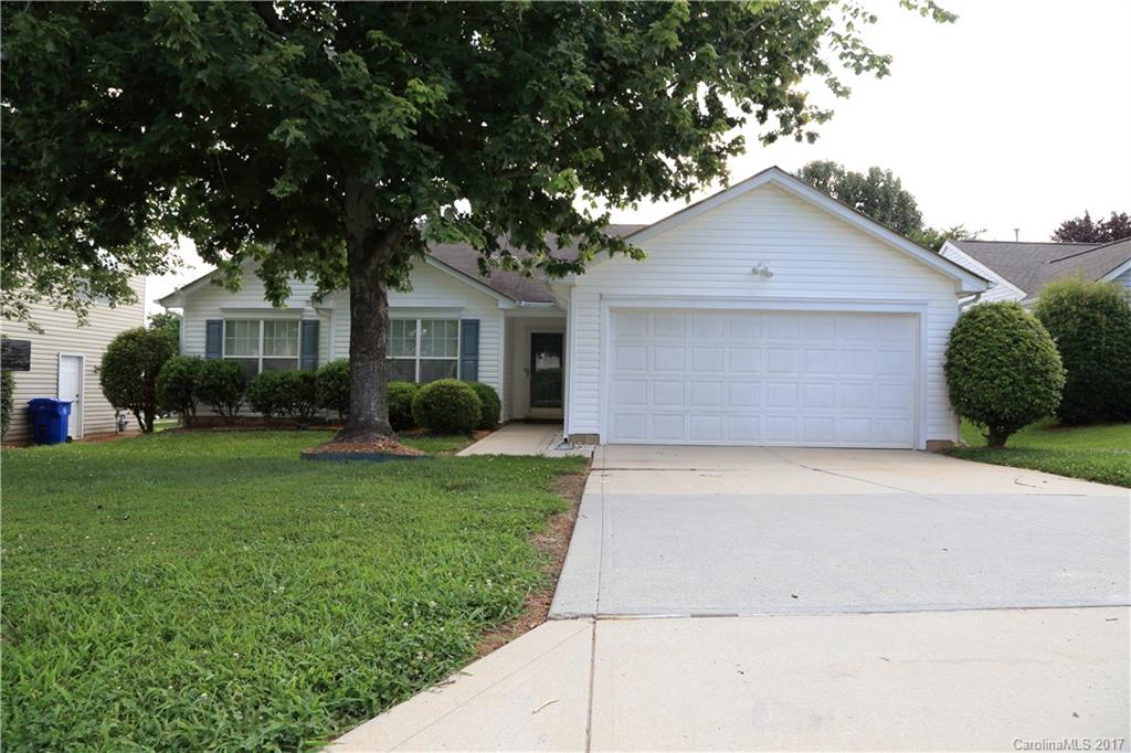Move right in and call it home! Many Updates including Fresh Paint & New Carpets in well maintained split floor plan ranch w/2 car garage.  Lots of natural light flowing through out home.  Arched entry way, Formal Dining room, spacious Living Room and open Eat in Kitchen complete with New Wood Look Floors, New Granite Counter Tops, Breakfast Bar, New SS Appliances (Stove/Oven, Microwave, Dishwasher).  Master Suite includes Jetted tub & great walk in closet.  Nice level backyard with patio.