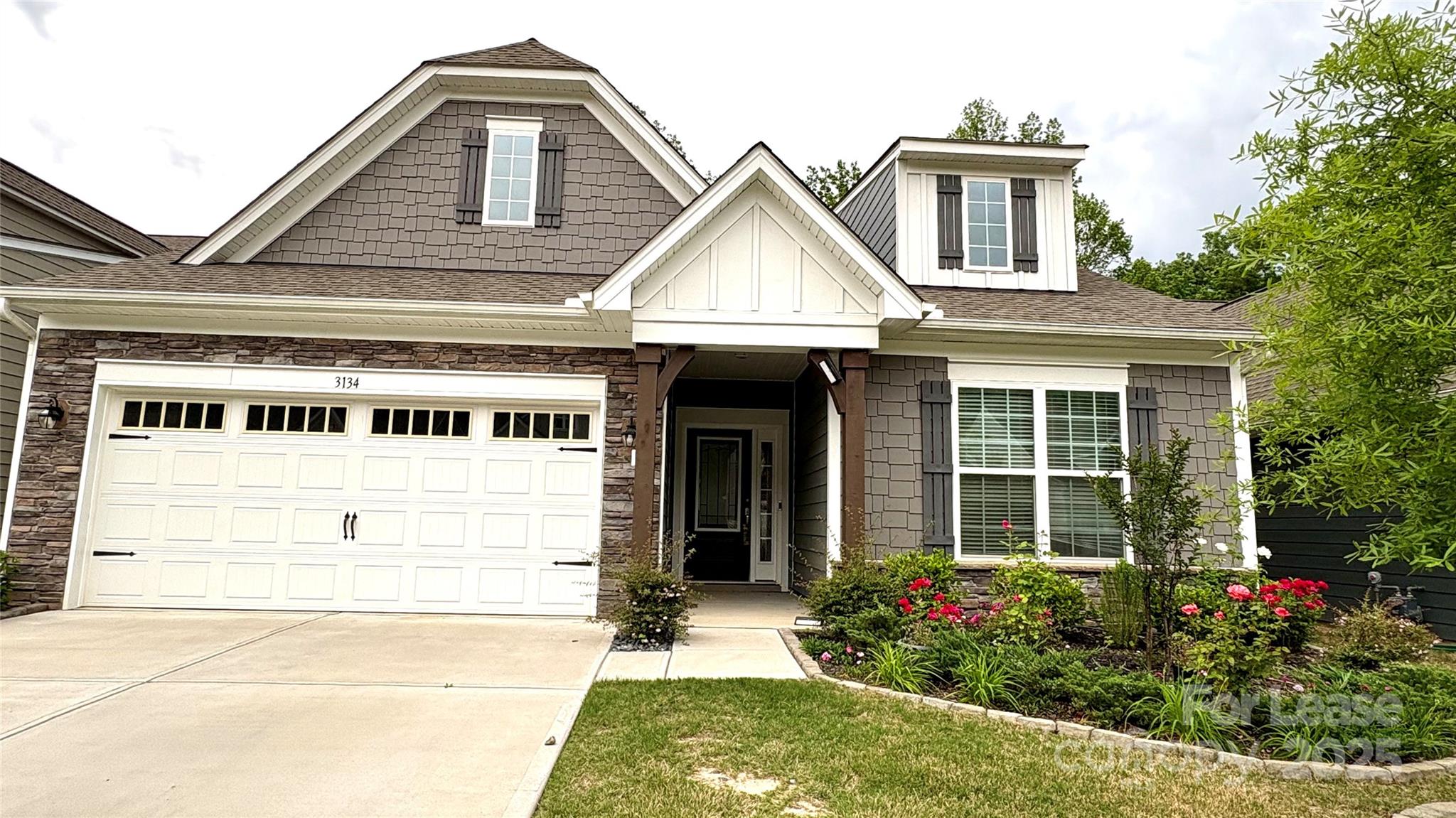 Charming 4-Bedroom Home in a 55+ Community in Tega Cay, SC - Discover this stunning 1.5 story home! Built in 2022, with 2,872 sq. ft. of living space, this home is designed to combine elegance, comfort, and functionality, offering everything you need for a relaxed and enjoyable lifestyle. Spacious and Open Living Areas: a cozy family room that flows seamlessly into a chef’s gourmet kitchen with granite countertops, modern appliances, and a breakfast area that opens to the patio. Formal Dining Room: Host memorable meals and gatherings in the elegant dining space. Main-Level Bedrooms: Three bedrooms, including a luxurious owner’s suite, are conveniently located on the first floor. The owner’s suite boasts a private screened-in porch with serene views of the surrounding trees. - Bonus Space Upstairs: A versatile bonus room, fourth bedroom, and full bathroom provide additional space for guests, hobbies, or a home office.