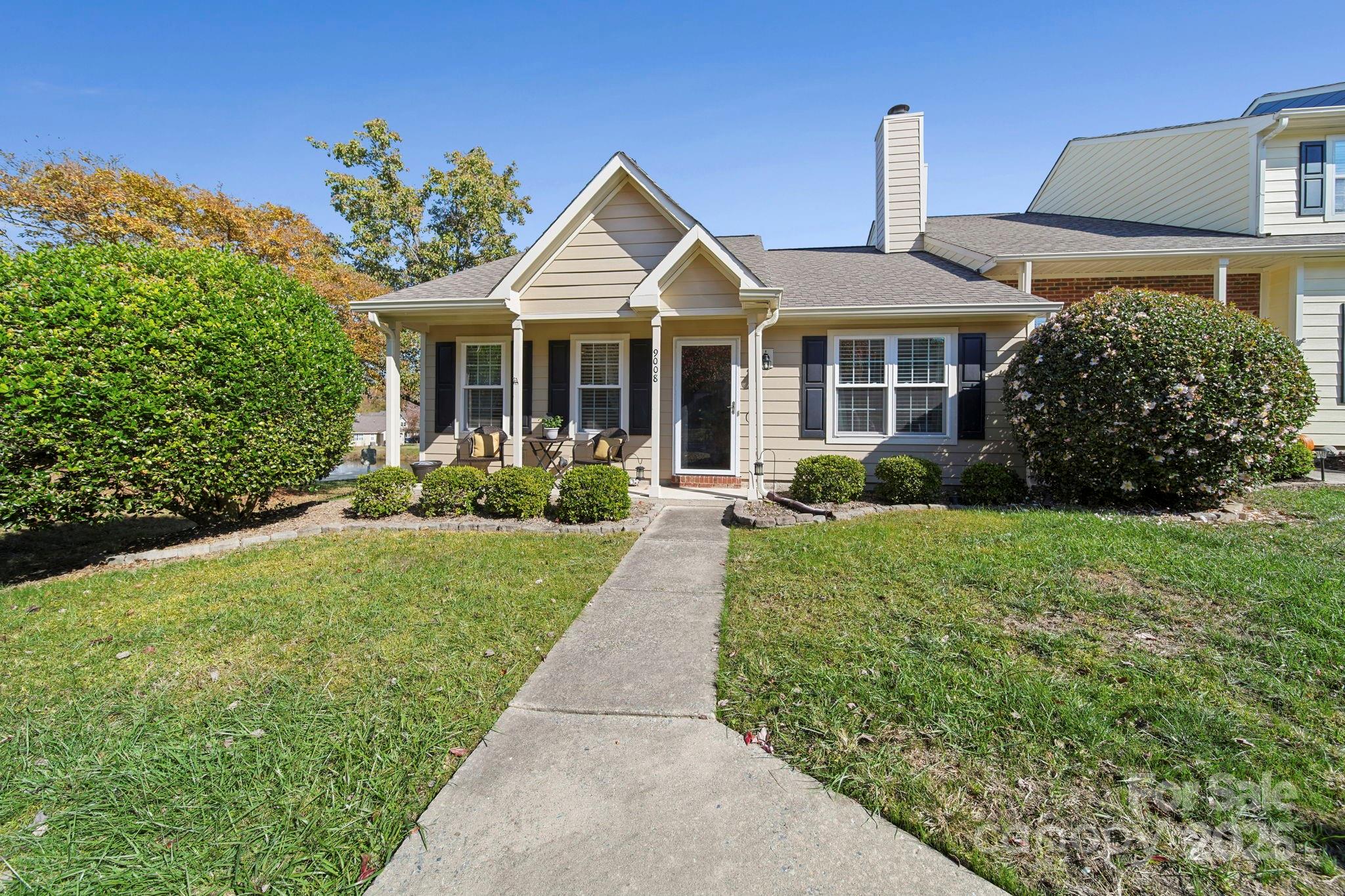 Welcome to 9008 Four Mile Creek Rd. This cheerful and beautiful, one story end unit townhome is located in the sought-after Arbourgate Meadows neighborhood. You are greeted by a charming front porch, perfect for your morning coffee. Upon entrance, the vaulted family room, anchored by the wood burning fireplace, makes for cozy evenings. The open floor plan leads you into the kitchen, overlooking the dining area. The primary bedroom has a vaulted ceiling, along with an en suite and walk-in closet. The roomy secondary bedroom has a ceiling fan and plenty of natural light. There are not one but two patios located out back, overlooking the picturesque pond. Additionally, there is a large storage closet out back to store bulky items. Windows were replaced in 2019. Bathrooms have been updated within the past year. Residents enjoy a community clubhouse and pool. There are 2 assigned parking spots. Located near shopping, restaurants, and top-rated schools. Don't let this pristine home pass you by.
