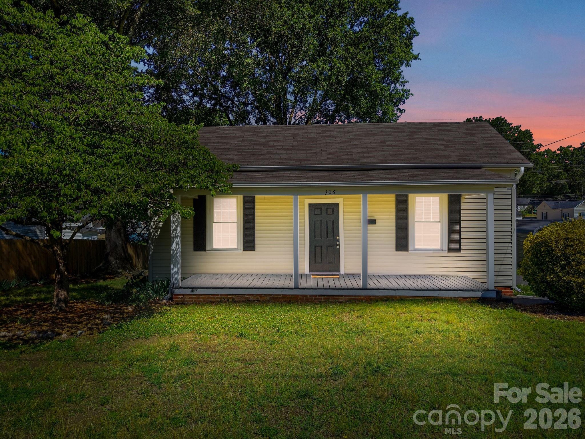 Great location! Just minutes from Downtown Kannapolis attractions and offering convenient access to I-85. This home features a spacious living room with beautiful wood flooring and built-in shelves. Highlights include detailed trim work and high ceilings. All three bedrooms are generously sized and include ceiling fans and wood flooring. The kitchen includes a deep sink with a pull-out faucet, new luxury vinyl plank (LVP) flooring, and granite countertops. The bathroom offers tiled walls and a granite-topped vanity. The property sits on a large lot and features a new deck accessible from the kitchen. Updated windows with blinds are installed throughout. Please note that some images are virtually staged. Don’t miss the opportunity to see this home—schedule your showing today!