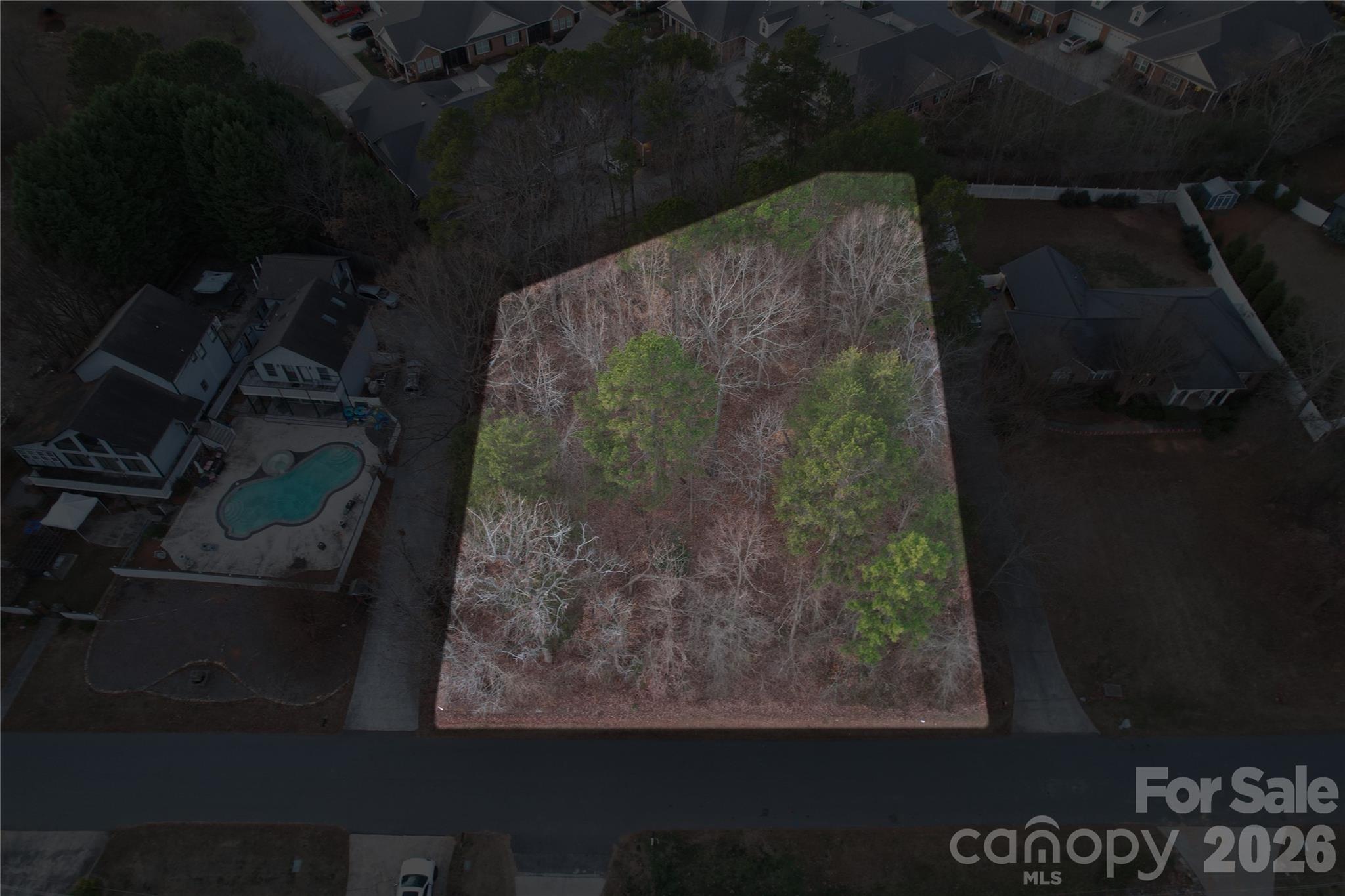 .47-acre lot with water views of Lake Norman and mature trees providing potential coverage following a new build. City water and sewer available. No HOA and no build restrictions—bring your plans and build your way. A rare opportunity for flexible ownership in a desirable setting. Follow Unity Church Road to see public access/boat launch to Lake Norman - Beatty's Ford Park.