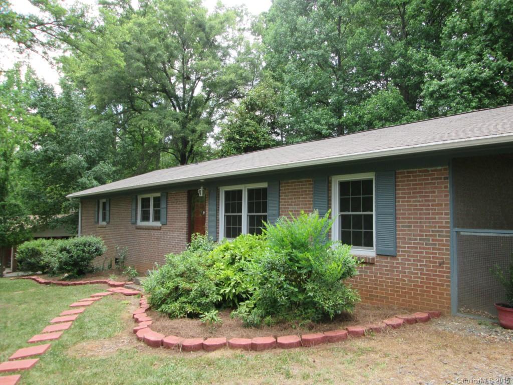 4BR/2BA brick with studio apartment via breezeway - ideal for... Main home has 1666+/- sq ft, and apartment 496 sq ft. Formal living and dining rooms, masonry fireplace in the family room, wonderful huge workshop and 2nd building. Newer windows, corian style counters, screened porch, HUGE deck, a lot of HOME for the money. PLUS a great neighborhood!