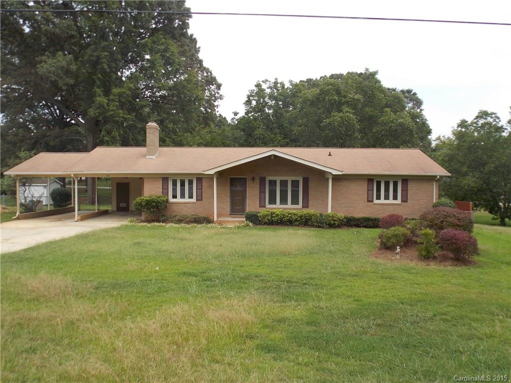 Large, well-cared-for brick home & huge 24x24 wired & heated Workshop! Equipped kitchen, breakfast bar, 3 spacious bedrooms, 2 full baths w/nice tile, fireplace in family room, front living room, plus dining room/flex space. Wonderful, bright 18' sunroom & big 31' connecting deck all overlooking the large, landscaped fenced backyard w/pecan trees. Storage shed plus shop building w/compressor rm, & tons of work space! Oversized carport w/big storage room. 2nd laundry inside. So much for the $ !!