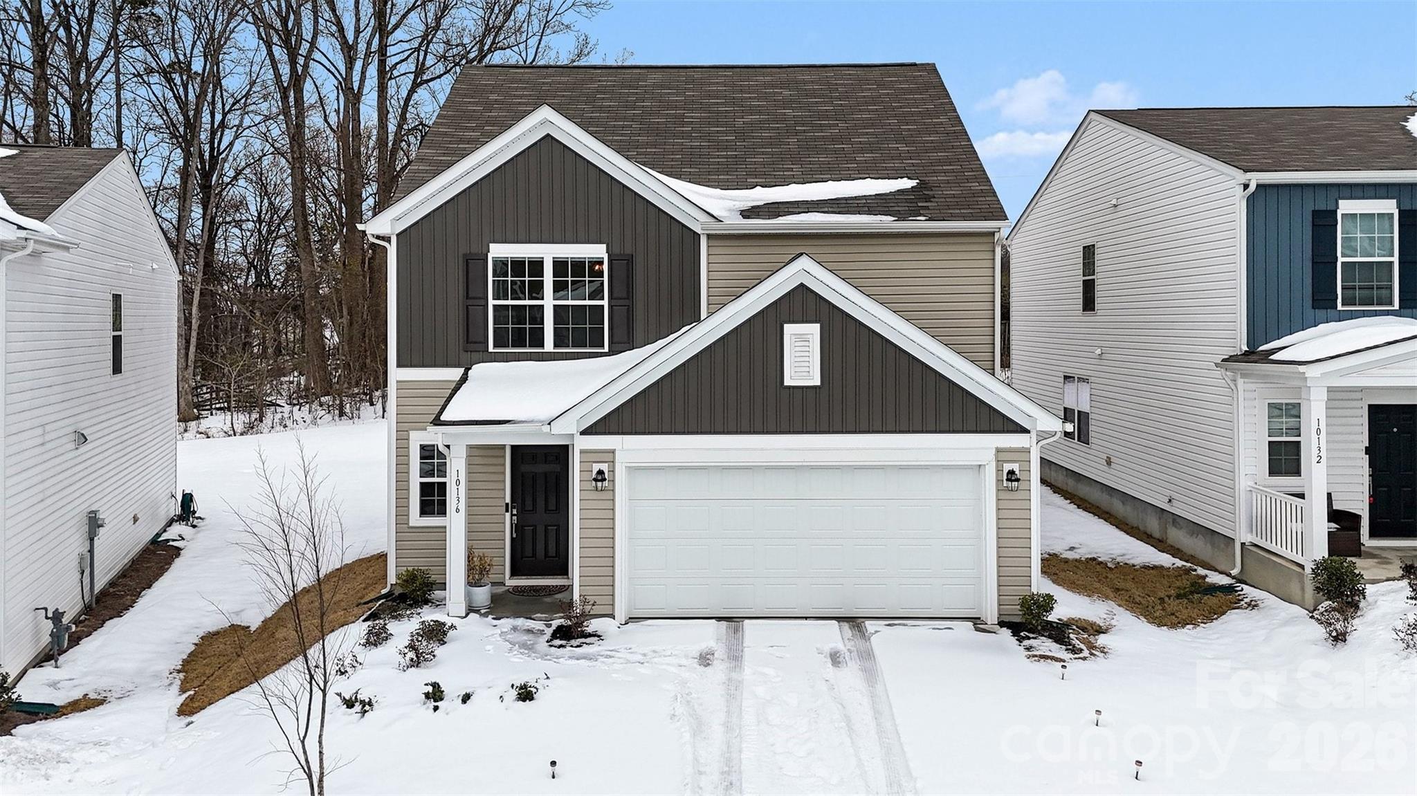 Built in 2024 and located in The Retreat at Cameron Commons, this move-in-ready home offers the perfect blend of modern finishes, open-concept living, and a hard-to-find layout with the primary suite on the main level. Inside, you’ll love the bright, airy feel created by an open floorplan, wide vinyl plank flooring, and recessed lighting throughout the main living spaces.

The kitchen is a true centerpiece with a large island, granite countertops, crisp white cabinetry, a pantry, and stainless steel appliances including a gas range, microwave, dishwasher, disposal, and refrigerator with ice maker. The kitchen flows seamlessly into the dining area and living room, making it ideal for entertaining or everyday living.

The main-level primary suite provides comfort and privacy with a spacious walk-in closet and an ensuite bath featuring dual vanities and a walk-in shower. Also on the main level, you’ll find a convenient laundry room and a functional half bath.

Upstairs offers plenty of room to spread out with four additional bedrooms, a full bath with double sinks, and a generous bonus room that can easily serve as a media room, playroom, or home office. Outside, enjoy a level lot and a backyard ready for relaxing, grilling, or play. Additional highlights include a two-car attached garage, architectural shingle roof, vinyl exterior, city water and sewer, and central air with ceiling fans for year-round comfort.