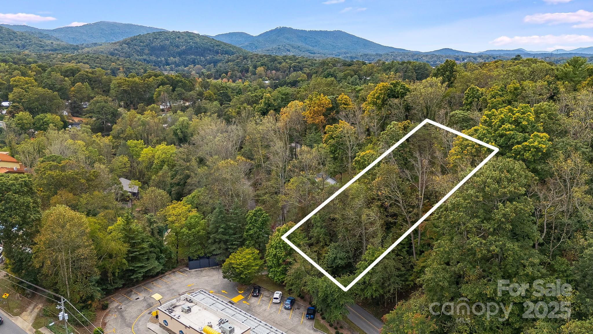 Unlock the potential to create a legacy home in one of Asheville’s most sought-after neighborhoods. This rare, half-acre lot in the Beverly Hills / Governors View area offers space, privacy, and proximity to everything that makes Asheville special. With infill lots rarely on the market here, this is your chance to build in a location that combines accessibility, tranquility, and elevation. Don’t miss this opportunity to lay the foundation for your next chapter.” The value is here! Builders Welcome! Comparables in this area confirm strong demand for quality builds, making this a smart investment.