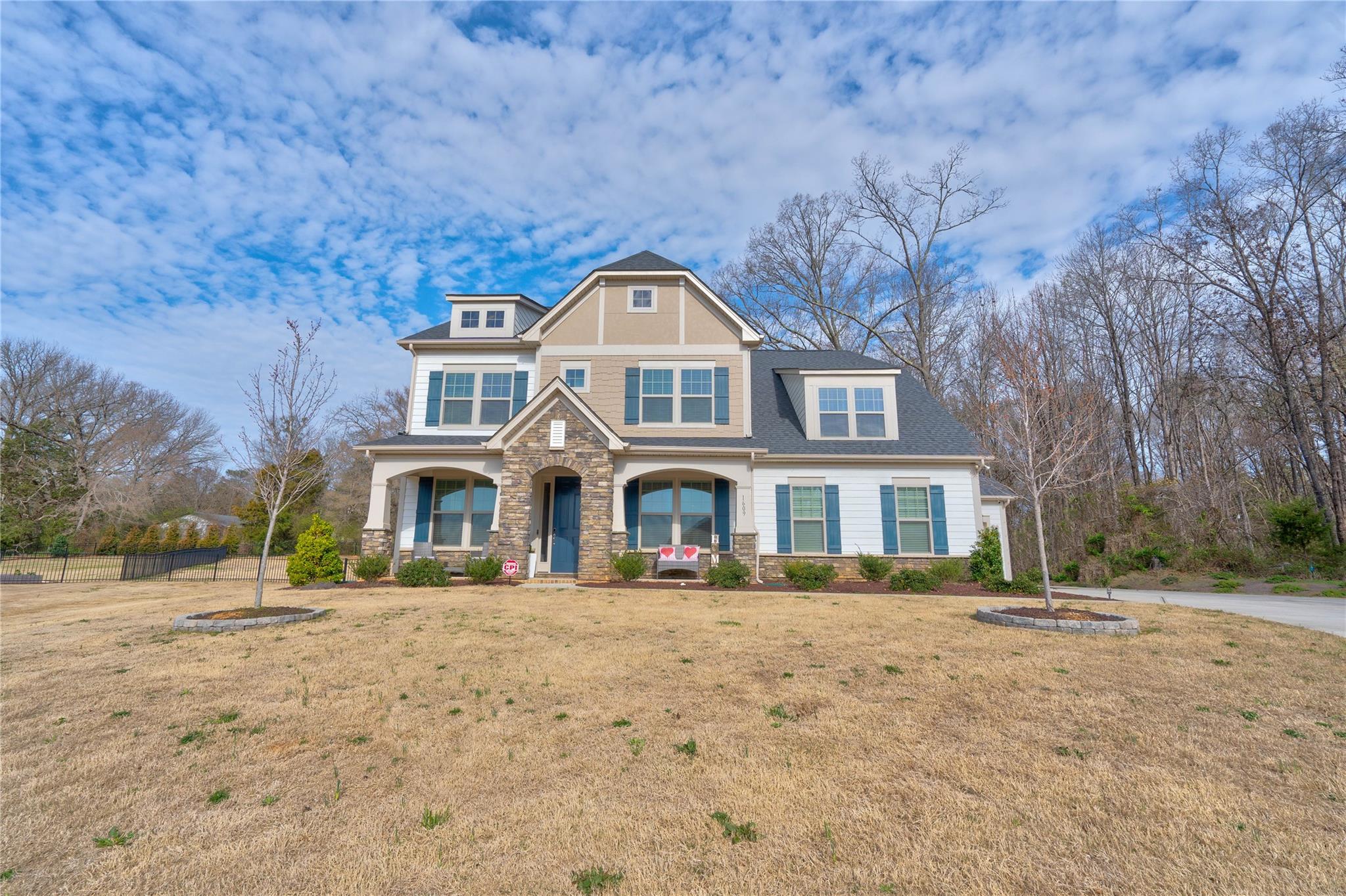 WOW!!! BEAUTIFUL 5 Bedroom/4.5 Bath home with 3 car garage on .55 acre cul-de-sac lot!  This home has so much to offer with almost 3900 sq ft and Open Floor Plan.  Kitchen has bright white kitchen cabinets, quartz counters, tile backsplash, SS appliances, huge island with bar, walk in pantry, breakfast area and a formal Dining Room.  Spacious Great Room has Beautiful Built-ins, a fireplace with gas logs, and plenty of room to entertain.  There is a guest bedroom with full bath on the main floor.  Office has a closet with extra storage as well.  Gorgeous Primary Suite features garden tub, walk-in shower, dual vanities with granite counters, linen closet, and custom walk-in closet.  All Bedrooms and Bonus Room have direct access to a bathroom.  Outside you will enjoy the expanded patio and fenced in backyard.  Convenient Location to shopping, restaurants and Lake Wylie!