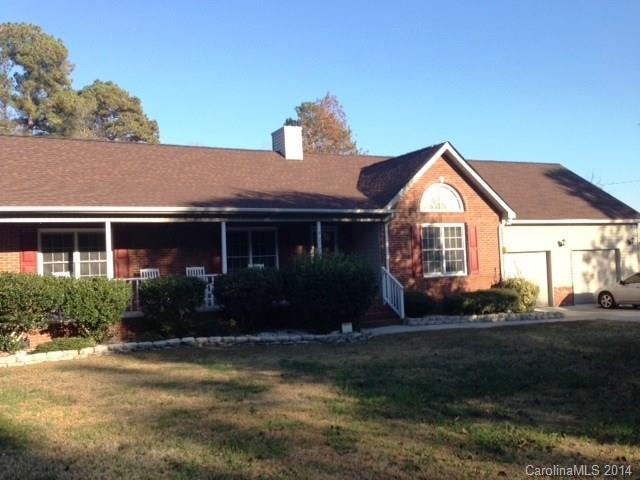 Come enjoy your huge front porch and back deck with lots of privacy in this awesome brick ranch, 3 BR 2BA home. Sits on 1.3 acre lot in the country and features cathedral ceilings and large stone fireplace, split bedroom plan with great kitchen and stainless appliances, kitchen leads to the mud room and 2 car attached garage. Off the back is a large 400 sq ft family room with vaulted ceiling.