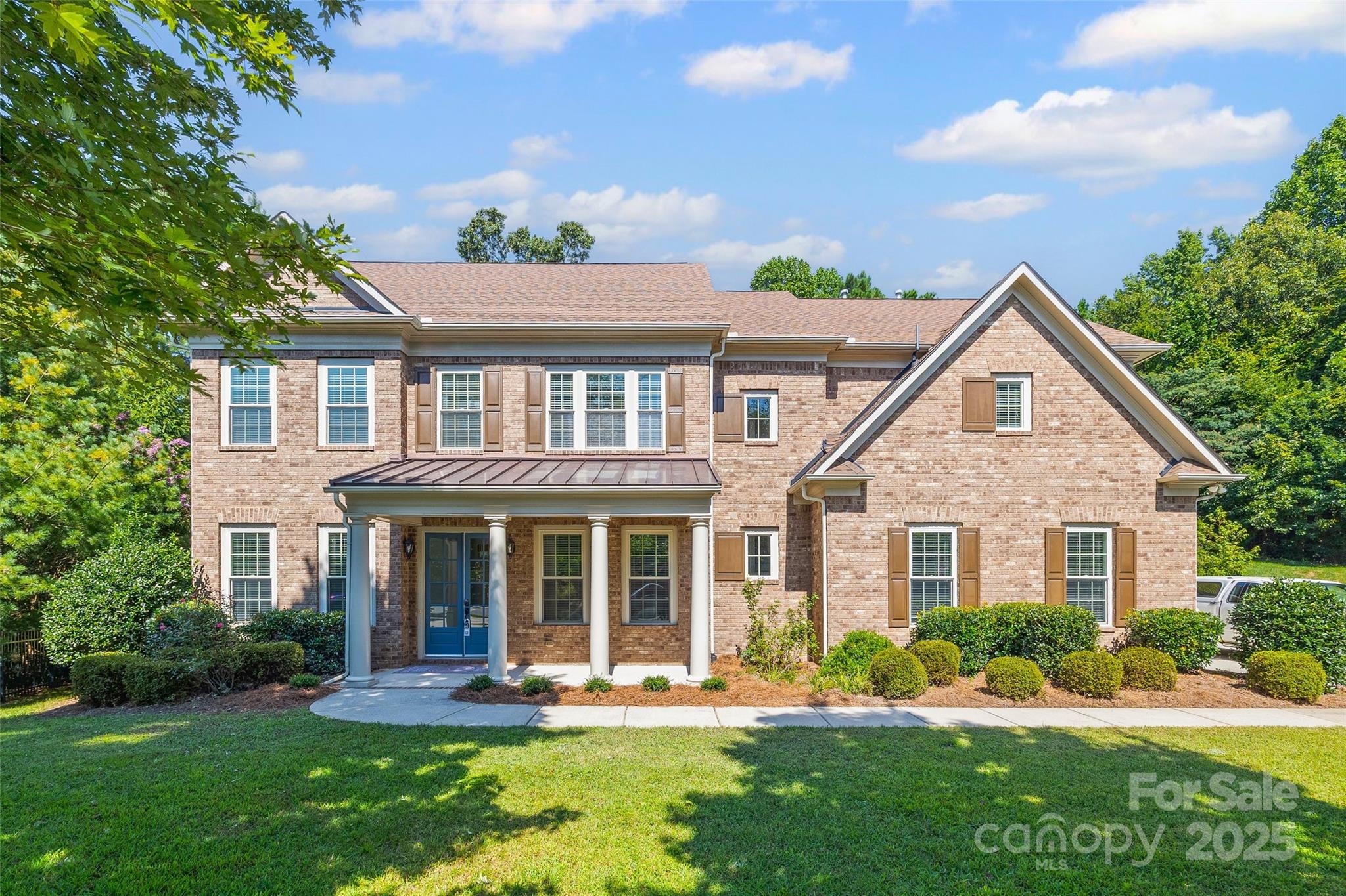 Back on the market with fresh updates! Nestled on a quiet cul-de-sac in the desirable Bridgemill community, this 3-story full-brick John Weiland home offers the perfect blend of timeless design and thoughtful improvements. The kitchen and downstairs bathroom have been refreshed to enhance style and function. The open floor plan features abundant natural light and site-finished hardwoods throughout the main level. A gas-log fireplace and custom built-ins anchor the great room, while the kitchen includes stainless steel appliances, a large island, and updated finishes. The main floor guest suite adds flexibility. Upstairs, the spacious primary suite includes his-and-her closets, double vanities, a garden tub, and a separate tile shower. Three additional bedrooms, two full baths, laundry, and a bonus room complete the second level. The third floor offers a versatile bonus room with full bath. 3-car garage, paver patio, and private backyard. Don't miss the resort style amenities.