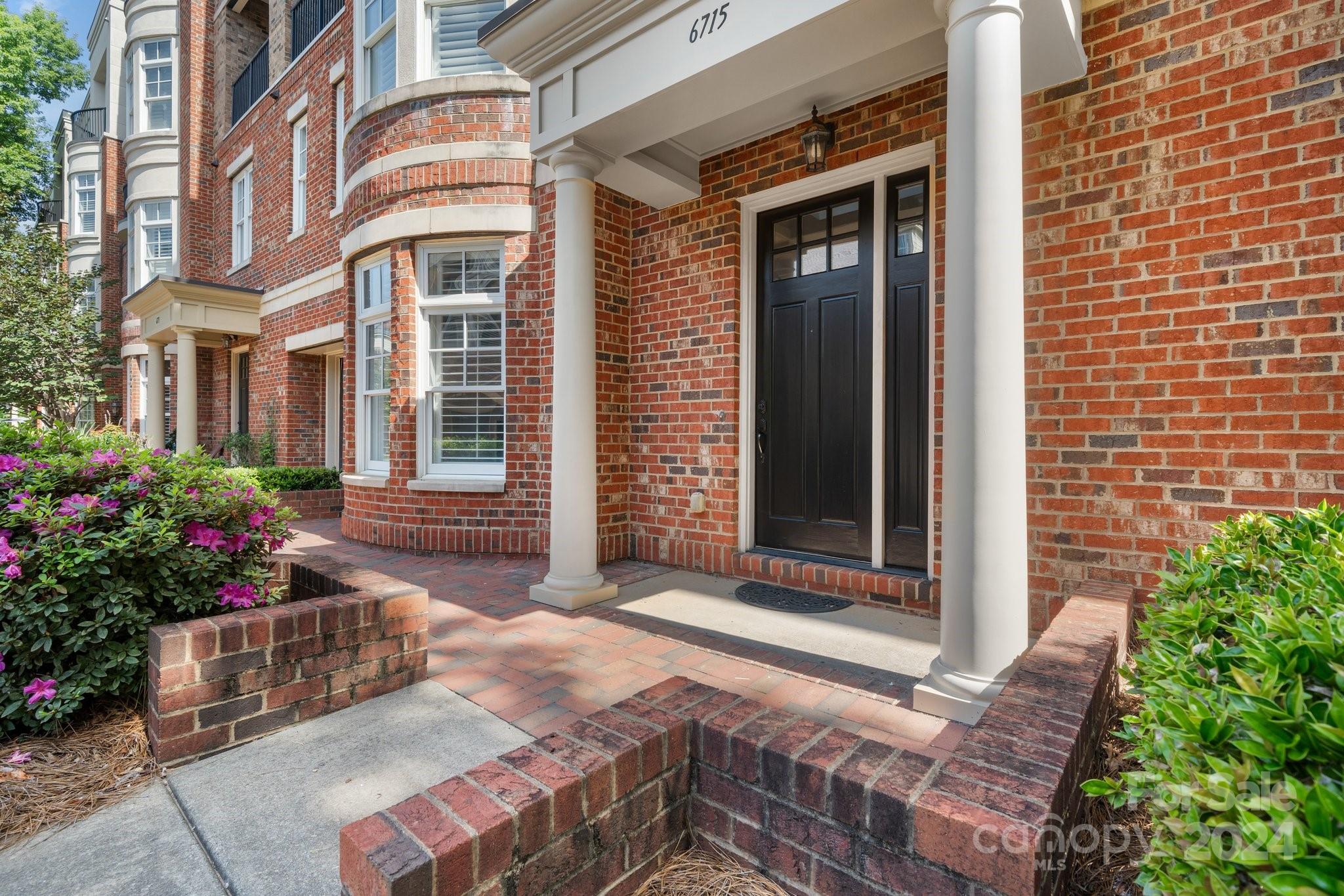 Discover the allure of this rare gem within a gated community of Louisburg Square, located in the highly desirable heart of Southpark. This all-brick, two-level condo offers an exceptional lifestyle with a direct walking access to an array of amenities, including shopping, dining, and entertainment.

Featuring 10-foot ceilings, gas fireplace, extra large windows for the ultimate experience in natural lighting with plantation shutters, freshly painted interiors, and move-in readiness, this home exudes elegance and modern charm. Beautiful hardwood floors flow seamlessly throughout, adding warmth and style to every room, with the lower level recently refinished. The HOA ensures maintenance-free landscaping, allowing you to enjoy your surroundings without the hassle.

Adding to its appeal is the attached garage—an uncommon find in this prime location. Don't miss the chance to own a piece of Southpark's finest living. This unique property is perfect for a lock-and-leave lifestyle.