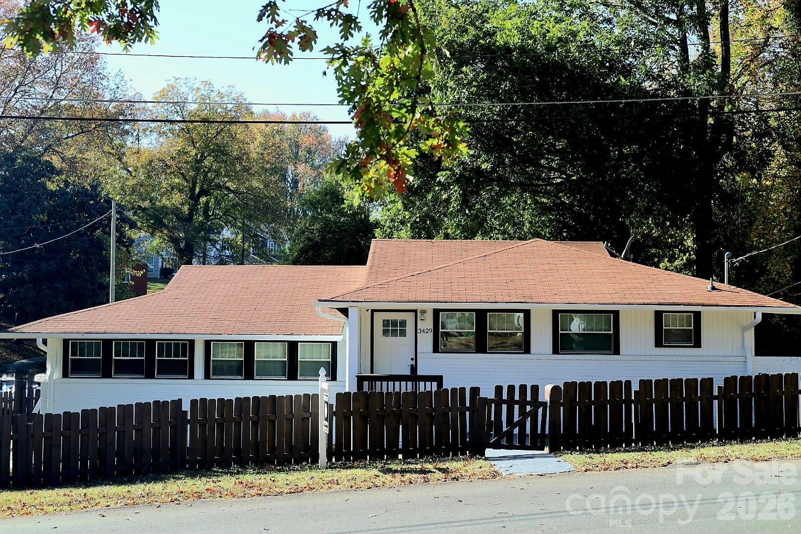 This immaculate home captures Charlotte’s Center City and NoDa vibes and is ready for you to move in or generate income right in the heart of Charlotte. Located seconds from NoDa and just 3 miles from Center City, it provides flexible living options by offering two separate spaces, each with its own private entrance, ideal for living with in-laws or earning rental income. Comfort and versatility are built in.
The property sits on a corner lot with a spacious fenced yard surrounded by quiet, professional neighbors. Recent improvements include an updated zoned HVAC system that allows each living area to control its own temperature, an extra water heater, and a crawl space vapor barrier for added peace of mind and value.
Positioned moments from NoDa Arts District and Plaza Midwood, you’ll have top-rated restaurants, breweries, shops, and nightlife at your doorstep. Charlotte’s two largest hospitals, Novant Main and Atrium Main, are only a few miles away.
Zoned for multi-family use but currently set up as a single-family home, this property offers exceptional flexibility. An optional floor plan demonstrates how the home could be combined into one cohesive living space for those preferring a traditional layout.
Opportunities like this are rare—this home is truly a must-see!