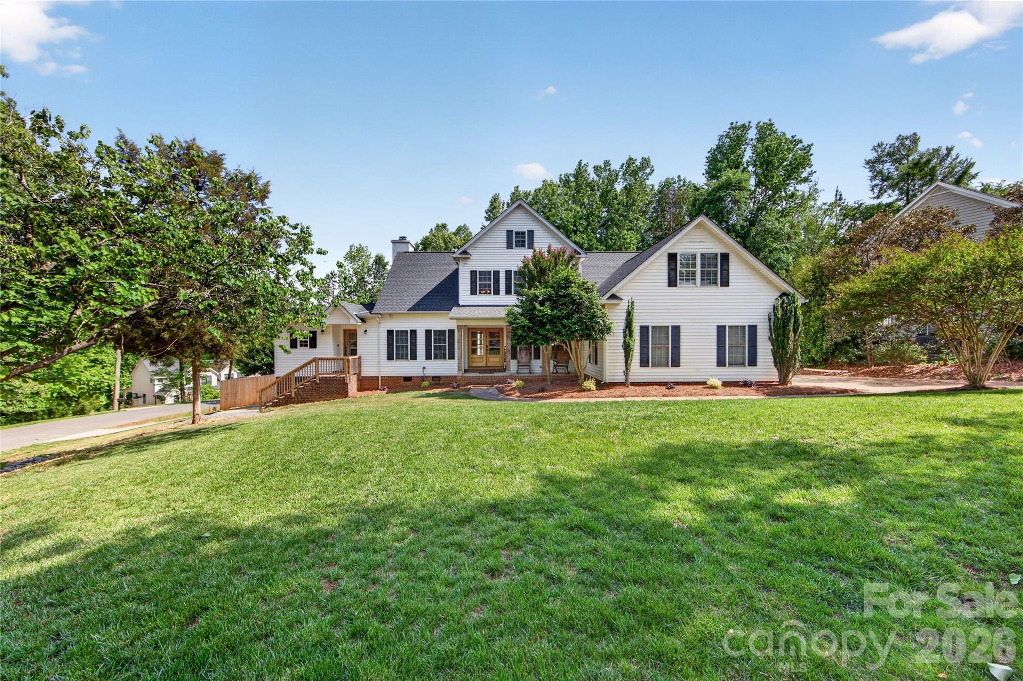 Welcome to one of the most incredible properties in Mint Hill!  Extensive upgrades throughout make this spacious home feel like new. The main level features a fully remodeled kitchen (2024) with new wood cabinets, quartz countertops, a quartz backsplash, and new appliances. The large primary bedroom is on the main level, featuring a bathroom remodeled in 2022 with elegant quartz walls, new flooring, a large shower with a recessed niche and bench, and a new vanity. A secondary living quarters was added on the main level in 2024. This 913 sq. ft. addition includes a kitchen, living area, flex space/bedroom, full bathroom, closet, zoned heating and cooling, and a tankless water heater.  Additional updates include refinished hardwood floors (2024), new roof with premium 50-year architectural shingles (2024), three new zoned heating and cooling units (2023), Luxury vinyl flooring in the sunroom (2023). The second level offers additional bedrooms, a playroom, a bonus room, and flex space. The outdoor living space is a private paradise designed for entertaining. It features a saltwater pool with a tanning ledge (2024), a 724 sq. ft. patially covered deck, a 417 sq. ft. paver patio with a VITA hot tub, a screened porch, a lower level covered patio area, all surrounded by the back yard privacy fence installed in 2024.  It is conveniently located close to the downtown Mint Hill area that offers lots of shopping, restaurants, and two county parks. Easy access to I 485.