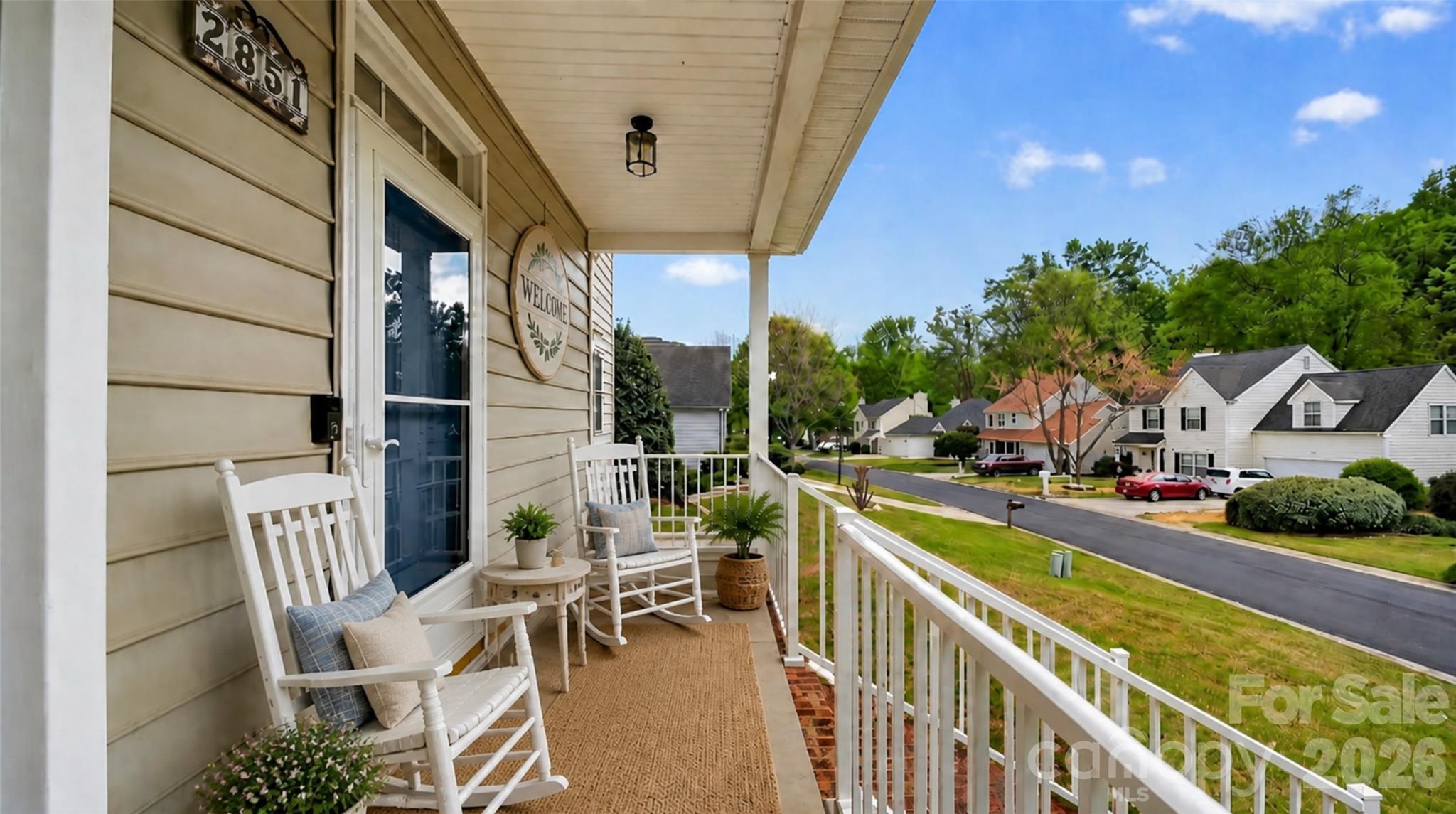 This isn't a house that was just built and listed. It's one that's been intentionally upgraded, year after year, until every system, every surface, and every finish earned its place. Tucked inside one of the most established and sought-after communities in the entire Charlotte Metro, this Fort Mill beauty delivers modern luxury without losing its classic charm.
Curb appeal sets the tone. A 3-car driveway, custom stamped concrete pathway, and wraparound front porch with aluminum rails and posts greet you before you reach the door. Vinyl maintenance free railings finish the porch with a clean, lasting look. Step through the brand new 2026 front door and the story keeps building.
Inside, rich hardwood floors run through every bedroom, every closet, every landing, and every inch of living space. Zero carpet. Anywhere. Dual HVAC serves upstairs and downstairs independently.. every floor holds exactly where you set it. A full 2024 lighting package covers the entire property, with designer fixtures in every bedroom, the foyer, staircase, upstairs landing, and laundry room, plus recessed lighting built into the master closets. 9 windows were replaced in 2025 with fresh seals and restored efficiency. The roof was replaced following hail damage, and extra wide gutters were added around the entire home and garage at the same time.
The kitchen got a full '20 rebuild. 14x15 feet of purpose-built cooking & gathering space. Quartz countertops, a black granite sink, a complete suite of LG black stainless appliances, and soft close cabinetry on every single cabinet. The oven vents directly outside instead of recirculating into the home (the detail most builders skip). A walk-in pantry handles serious storage and keeps the kitchen itself clean and functional. A custom 10x16 dining room was added to the original floor plan, expanding the footprint and creating a dedicated space for entertaining at any size. The living room fireplace features a custom tile surround that grounds the main level with warmth and intention.
The primary suite is its own retreat. His & hers walk-in closets. A master bath redesigned from the floor up with a two-head shower, heated tile floors, quartzite countertop, and custom ceramic vessel sinks handcrafted by a local potter. That finish does not exist in any other listing in this market. The first floor bedroom carries its own attached full bathroom, fully renovated with a walk-in shower, new vanity, mirror, updated lighting, toilet, and tile. Guest suite, in-law quarters, private office with a full bath.. the flexibility is real.
The backyard is where this house pulls away. A private outdoor retreat built for real living, with storage stitched in everywhere you look. The fully screened rear porch connects the main house directly to the detached garage and functions as a true breezeway (a rare architectural detail that adds both everyday convenience and livable outdoor space). Inside the detached garage sits a fully enclosed bonus room with its own dedicated HVAC unit, a sink, and a floor drain built in. Home gym, workshop, recording studio, art space.. the infrastructure is already there. A separate outbuilding works as a potting shed or yard tool storage and comes wired with its own electrical panel including 220 service. A dedicated concrete pad sits ready for a fire pit, outdoor kitchen, hot tub, or whatever the next owner envisions.
Minutes from I-77 and I-485. Easy access to Charlotte, Carowinds, & Cabelas. Zoned for one of the top-rated school districts in South Carolina. Mature trees, established streets, real community. This neighborhood has already arrived.
This is not a standard listing. This is a decade of investment, intention, and craftsmanship offered to one very fortunate buyer.