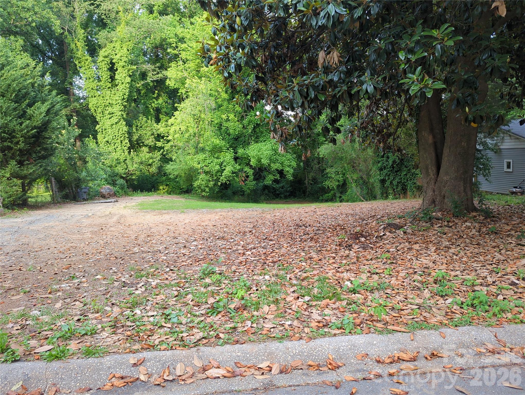 Rare oversized infill redevelopment opportunity in rapidly appreciating West Charlotte. Cleared and graded 12,405 sq ft lot with approximately 75 feet of frontage and N1-B zoning confirmed for single-family, duplex, and triplex development potential. Exceptional opportunity for builders, investors, and multifamily developers seeking immediate by-right density potential in one of Charlotte’s evolving growth corridors.

The property offers strong site usability with substantial frontage, existing neighborhood infrastructure, and excellent redevelopment flexibility. Ideal for custom infill construction, duplex development, triplex development, or long-term investment hold strategy. The lot’s cleared and graded condition may significantly reduce upfront development costs and timelines.

Located near major redevelopment activity with convenient access to Uptown Charlotte, employment centers, dining, entertainment, and transportation corridors. Surrounded by ongoing revitalization and new construction activity contributing to strong appreciation trends throughout the West Charlotte market.

Rare opportunity to acquire a development-ready infill parcel with confirmed multifamily potential in a high-demand growth area. Buyer to verify all development plans, permitting requirements, utilities, and intended use with the City of Charlotte.