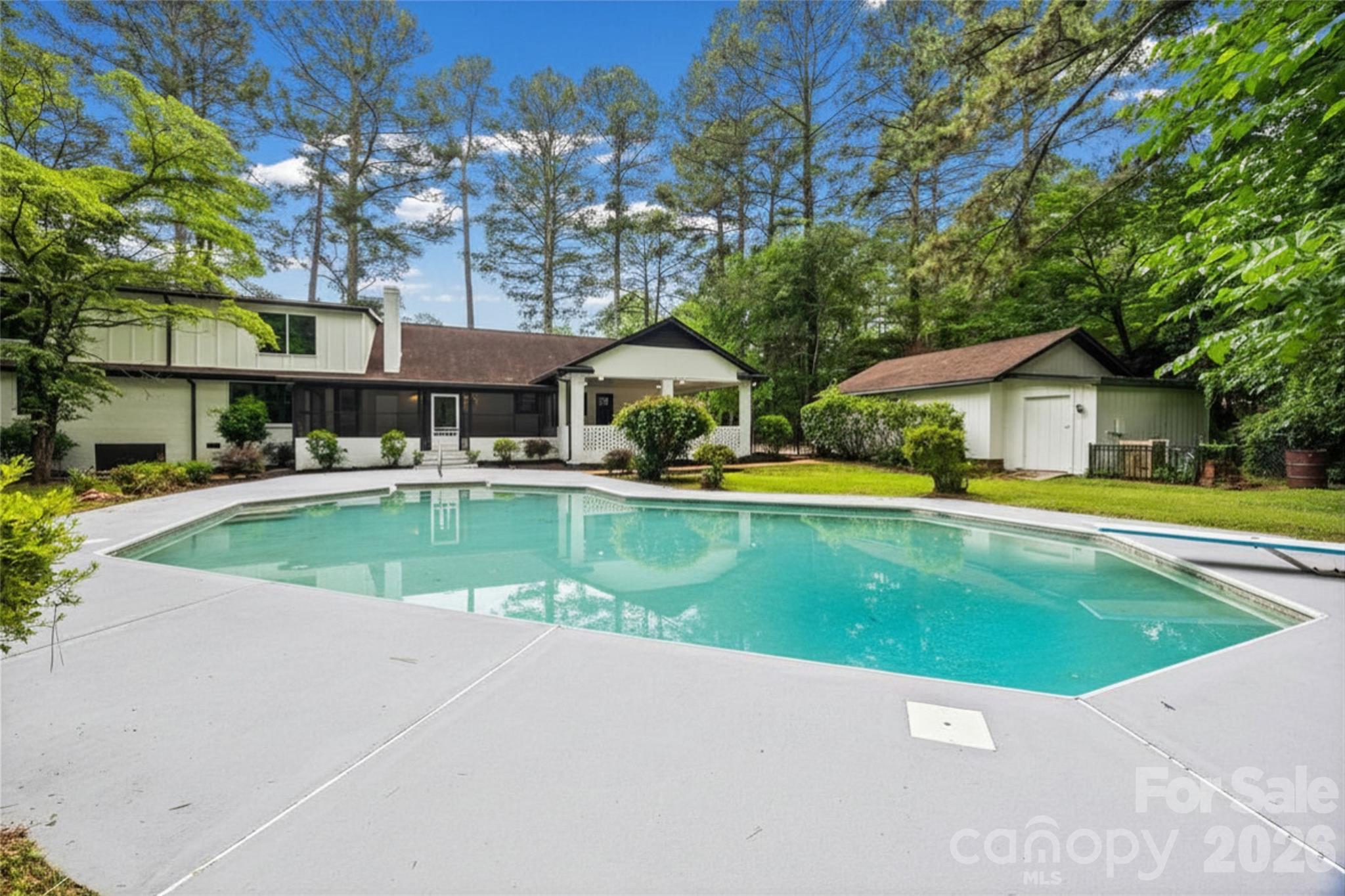 Private estate-style living on 1.28 acres in Rock Hill's highly desirable Meadow Lakes community!

Welcome to 1263 Wendy Road, a beautifully renovated 5-bedroom, 4-bath home offering nearly 3,900 square feet of thoughtfully designed living space surrounded by mature trees, exceptional privacy, and resort-style outdoor living.

Extensively updated while preserving its timeless character, this home offers a level of flexibility rarely found in today's market. With three bedrooms featuring ensuite bathrooms and multiple options for primary suites, the floor plan is ideal for multigenerational living, extended guests, work-from-home lifestyles, or families seeking additional privacy and space.

At the heart of the home, the beautifully updated kitchen opens to spacious gathering areas designed for everyday living and entertaining. The impressive family room provides an incredible central gathering space, while the oversized flex room offers endless possibilities as a billiard room, media room, home gym, office, or playroom.

Step outside and discover what truly sets this property apart. Situated on a private 1.28-acre lot, the backyard feels more like a personal retreat than a traditional neighborhood setting. Mature landscaping, established gardens, stone pathways, and towering trees create a peaceful backdrop for the beautiful in-ground pool and outdoor living spaces. Whether hosting friends, enjoying family gatherings, or simply relaxing after a long day, this backyard was designed to be enjoyed.

Additional highlights include a spacious laundry room, walk-in pantry, detached garage, covered carport, and abundant storage throughout.

Located in one of Rock Hill's most established neighborhoods, Meadow Lakes offers the charm of mature landscaping and larger homesites while remaining convenient to shopping, dining, healthcare, and all the growth occurring throughout the area.

Move-in ready homes offering this combination of acreage, privacy, flexible living space, multiple ensuite bedrooms, and resort-style outdoor amenities rarely become available. Schedule your private tour today.