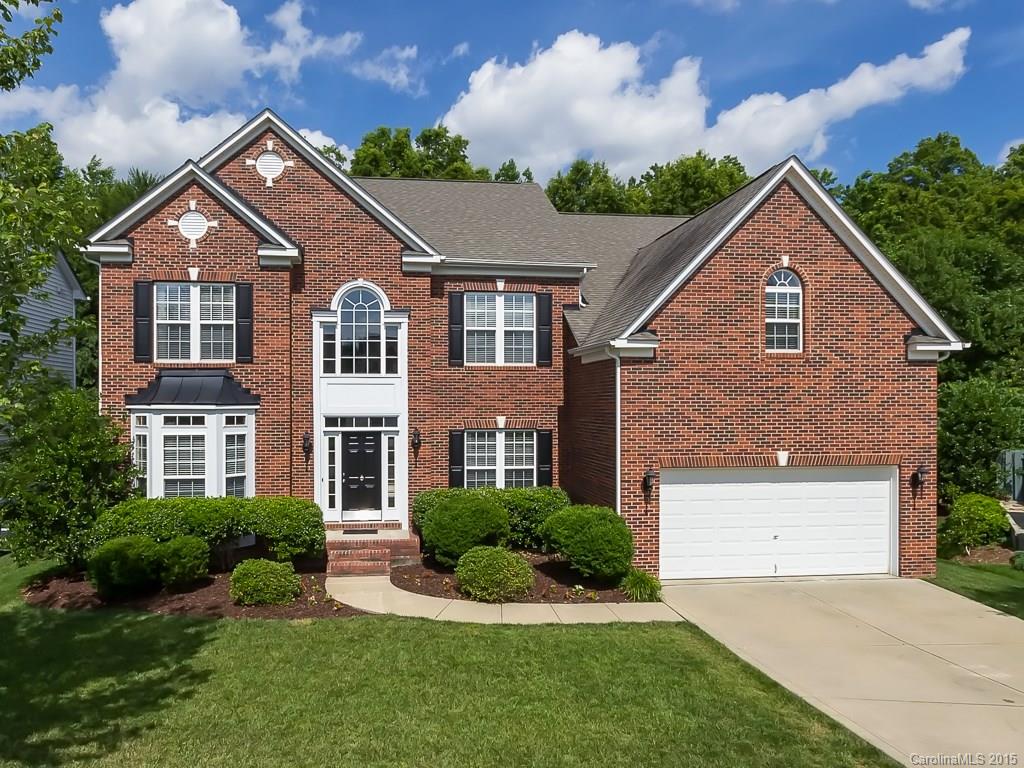Looking for an impeccably maintained, spacious home with an open floor plan that is move-in ready? This is it! Huge 2-story great room with stacked-stone fireplace flows into beautifully appointed kitchen w/Corian c’tops, tumbled travertine backsplash, SS appliances & double ovens! Sunroom, office & full bath on main. Master retreat features grand spa bathroom; his & her walk-in closets. Beautiful paver patio & fenced, private backyard for relaxing & entertaining. Come discover it today!