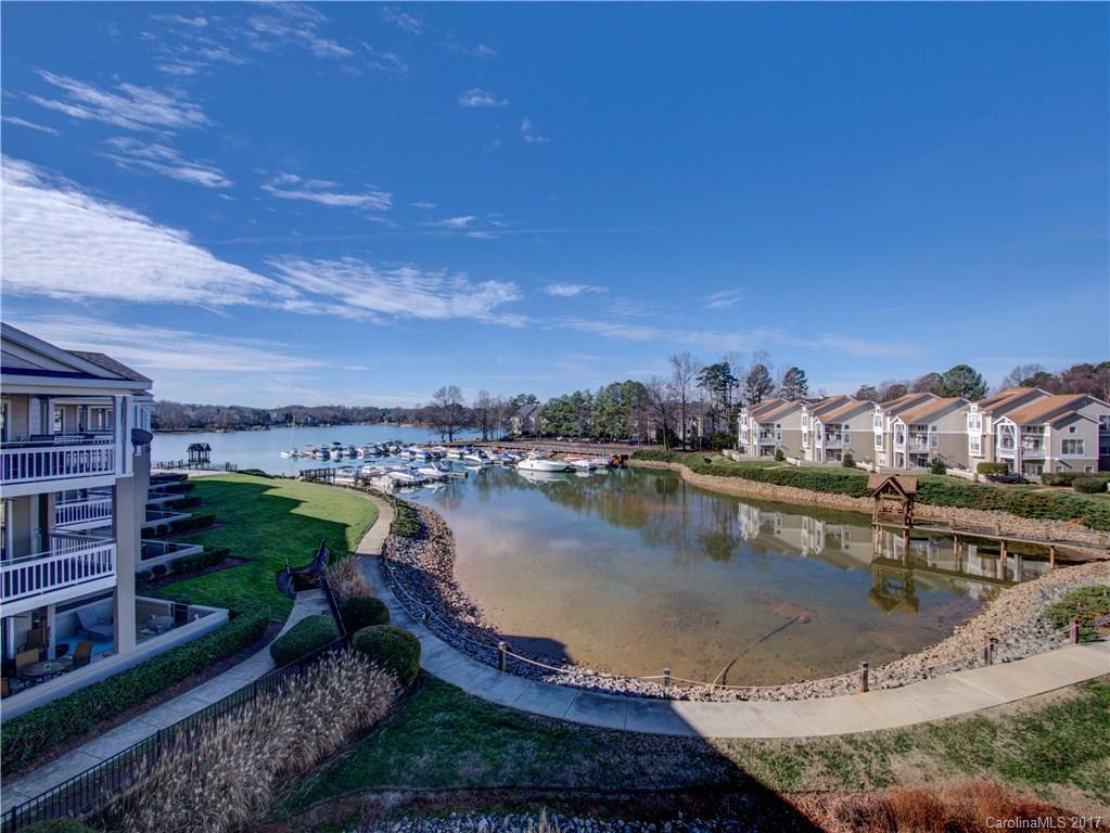 End Unit Penthouse w/highceilings, wood  floors and newer carpet. Granite counters in kitchen , tile back splash, eat in breakfast area w/ lake view. Split BR plan with Master boasting large Lake views. Great deck overlooking both Lake Norman and large pond with water fountain for soothing afternoons. The best of lake living in one of the larger size units in Davidson Landing! View virtual tour!.Boat slips available to lease Ready for May 1st move in! Possibly a bit sooner