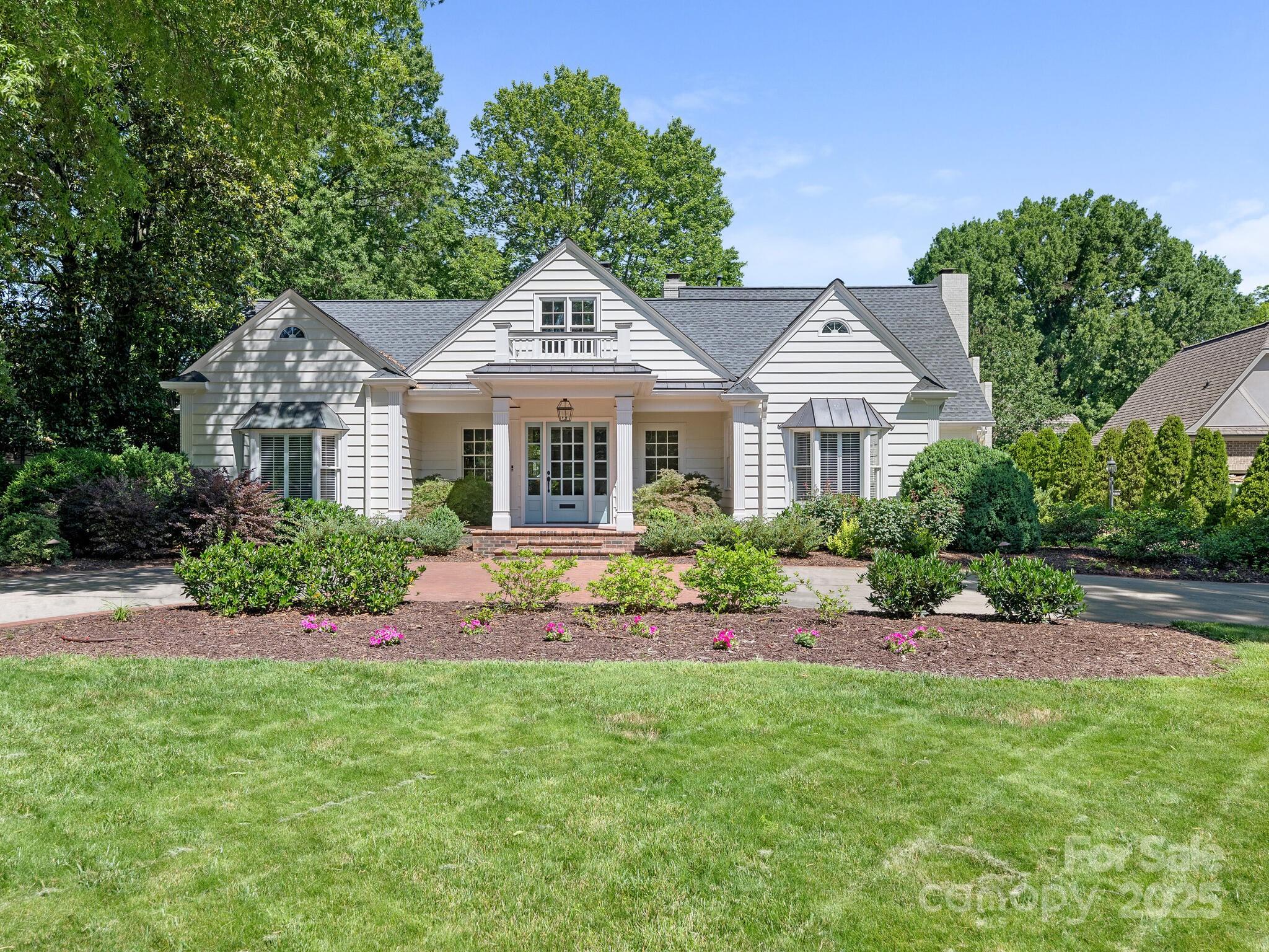 Stately story & a half home on flat .82 acre lot w/circular drive.Spacious foyer opens to LR w/ FP.Adjoined by oversized DR connected by wine bar to fabulous kitchen/family room with FP.Breakfast room surrounded by wrap around windows,computer niche,drop zone & laundry down.Great room w/ FP, coffered ceiling,& french doors opening to uncovered/covered patio.Primary on main with two spacious walk in closet,stunning bathroom with shower & free standing tub. Two additional bedrooms, one full & one half bath on main. Guest wing up w/ br,flex space,full bath&oversized cedar closet perfect for off season clothes.Opposite wing up w/ bonus/5th br full bath &exercise room.Private flat backyard fenced in pool w/ tons of decking. Detached 2 car garage w/ bonus/6th br above.Full bath, kitchenette down & additional patio w/ tv perfect for entertaining by the pool.Shed w/ wood working space. Covered garden.The layout,livability,&privacy of this home is unrivaled you must see it to believe it!