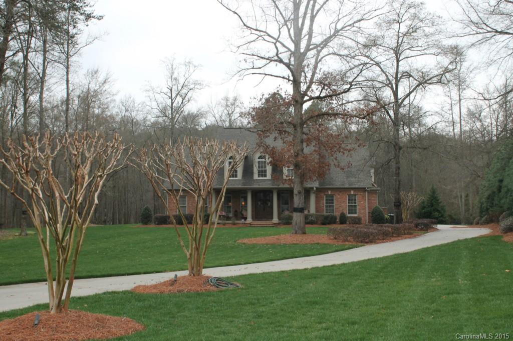 Stunning custom home on 3.5 acres in Rock Hill's Meadow Lakes II. Lot has been professionally landscaped and is fully irrigate. House features a large rocking chair front porch, screen porch and back patio area. Inside the home, no details have been left out. Extensive moldings, surround sound, central vac, large chefs kitchen. Master on main plus guest suit and huge bedrooms upstairs with additional den and bonus room. Walk to community pool and tennis.