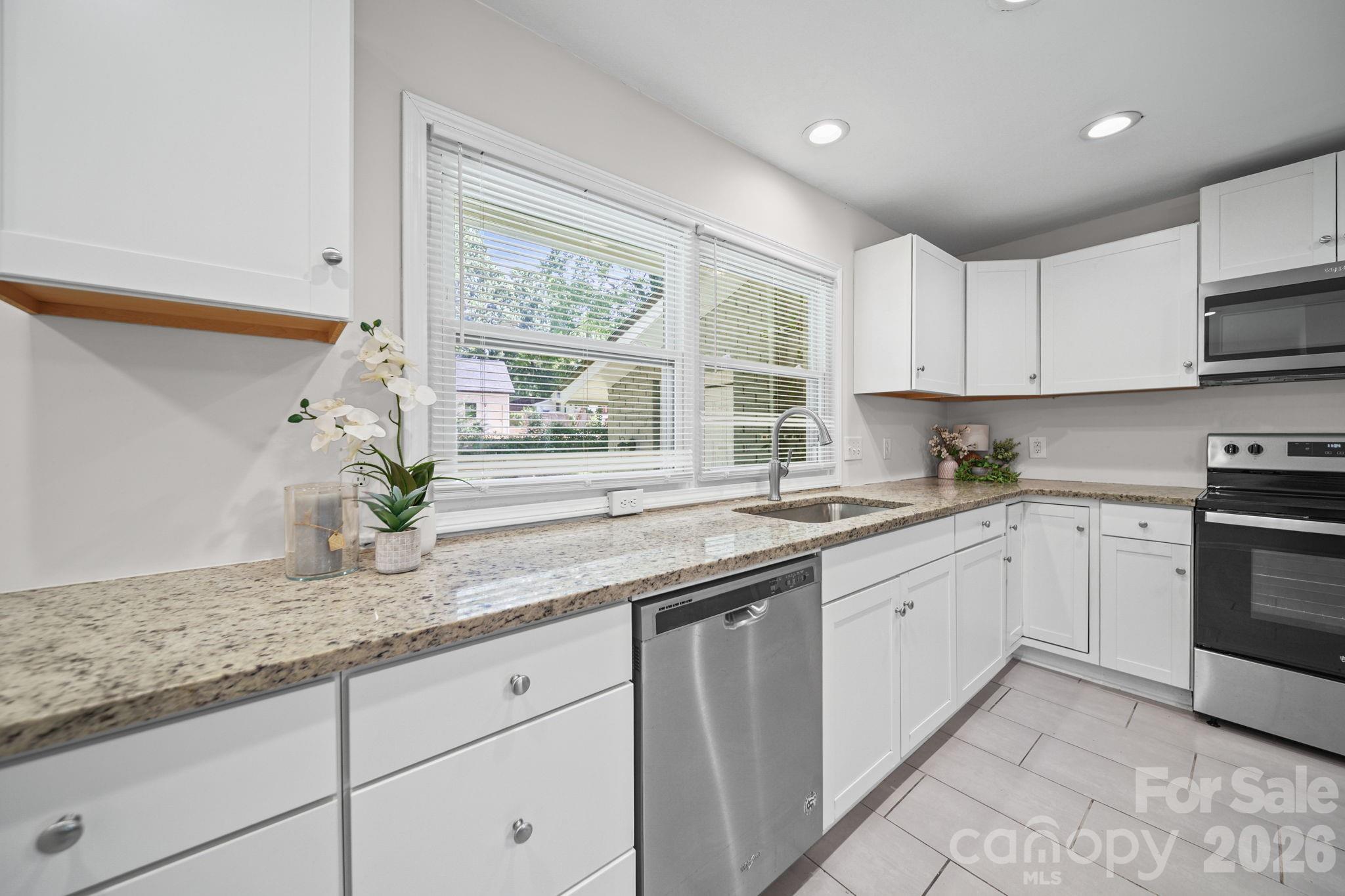 Beautifully updated and move-in ready, this charming one-story brick home offers the perfect blend of modern updates and timeless appeal. The open-concept floor plan is filled with natural light and features beautiful hardwood floors throughout, creating a warm and inviting living space.

The updated kitchen is designed for both everyday living and entertaining with quartz countertops, abundant cabinet storage, a large farmhouse sink, and stainless steel appliances. Updated bathrooms, a newer roof (2021) and thoughtful improvements throughout make this home truly turnkey.

Outside, the expansive front and back yards provide endless opportunities for outdoor entertaining, gardening, play, or future enhancements.

Conveniently located with quick access to major highways, Uptown Charlotte, Charlotte Douglas International Airport, shopping, dining, and everyday conveniences, this home offers both comfort and an unbeatable location. Previously a successful rental property, this home also presents an excellent opportunity for investors looking to add a move-in ready property to their portfolio or for first-time investors seeking a turnkey rental. Don’t miss your opportunity to make this beautiful home yours!