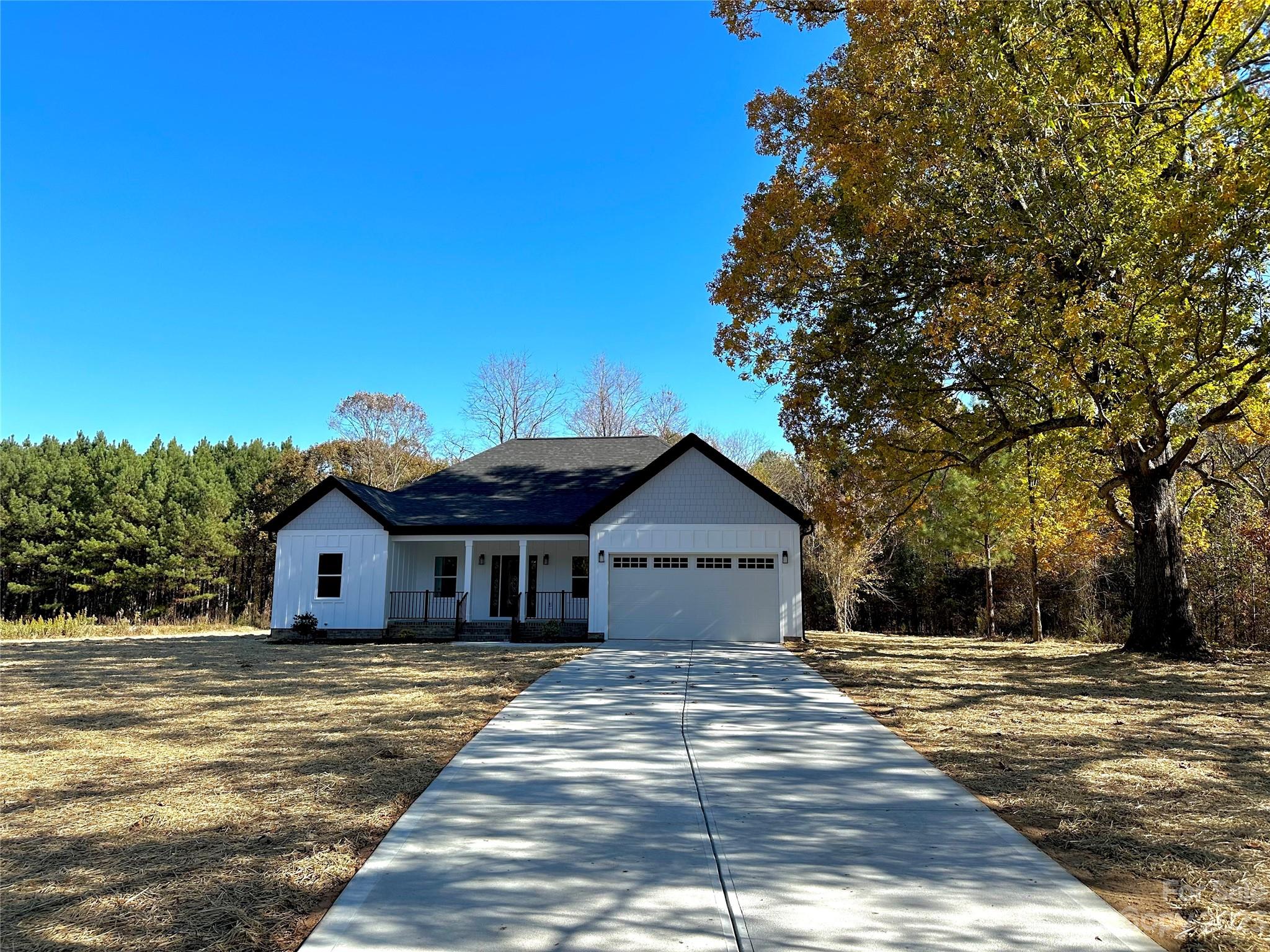 Make this beautiful modern craftsman style home yours! This new construction home is sitting on 1.02 acres, with the privacy you've been dreaming of. This homes features the perfect kitchen for you with an oversized sitting island that offers a view into the great room, and an open-concept dining room! Don't miss out on this great opportunity in Cherryville! Ceiling fans work with remotes, the builder has remotes.