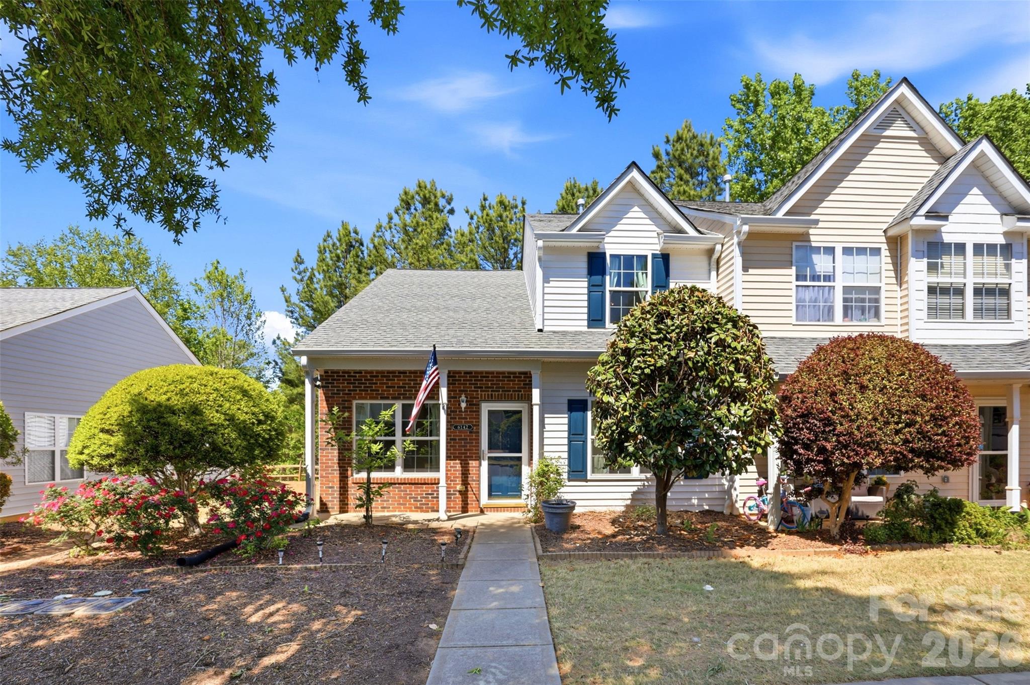 Welcome to this beautifully UPDATED END-UNIT townhome in the affordable Hanover neighborhood of Indian Land—where comfort, convenience, and smart upgrades come together. This 2-bedroom, 2.5 bath, plus large loft/flex/possible 3rd bedroom home offers the ease of main-level living with a spacious primary suite on the first floor, featuring a walk-in shower/tub combo designed for both relaxation and accessibility. The open layout flows effortlessly, with updated flooring, vaulted ceilings and natural light pouring in thanks to all new Pella windows and doors—a rare and valuable upgrade. The kitchen has granite countertops and stainless steel appliances, pantry, and spacious dining area. A convenient half bath rounds out the first floor. Upstairs, you’ll find a spacious loft/flex area ideal for a home office, media room, or play space—with the option to easily enclose for a third bedroom if desired. A generously sized secondary bedroom and full hall bath provide comfortable separation and flexibility for guests or family.
Major systems have already been handled for you, including a newer HVAC and water heater, giving peace of mind where it matters most. Step outside to your private back patio—perfect for quiet mornings or unwinding at the end of the day. Attached shed room provides additional storage. As an end unit, you’ll enjoy added privacy and extra light, setting this home apart from the rest. Assigned parking is included, with ample additional unassigned spaces conveniently located nearby. Enjoy low-maintenance living with community amenities that include lawn maintenance, an outdoor pool, playground, picnic area, and sidewalks throughout. Ideally located close to shopping, dining, and top-rated Indian Land schools, this home checks every box. NO RENTAL CAP! 

Low-maintenance living in a prime location—this is exactly the kind of home buyers wait for.