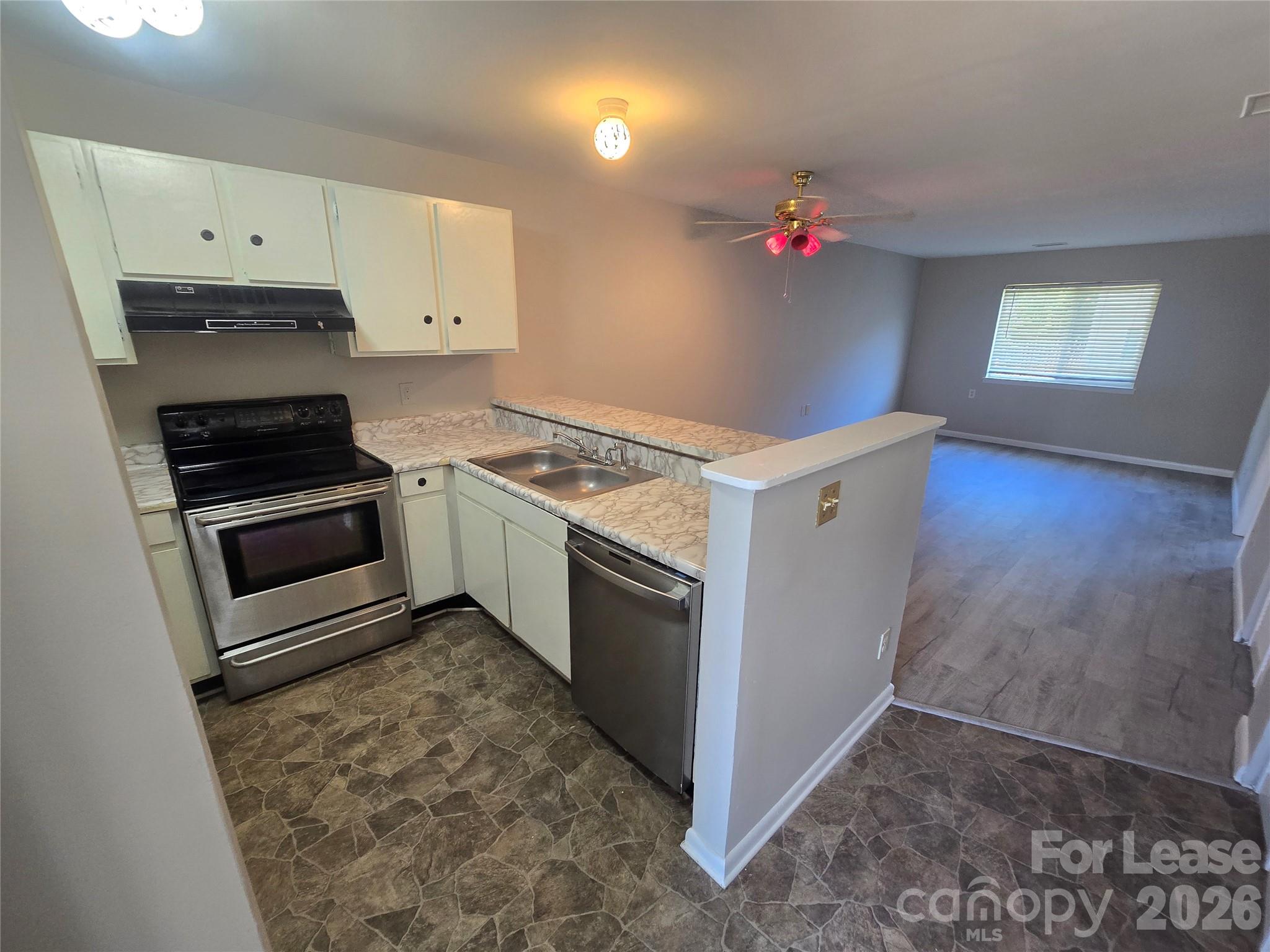 Experience modern living in this beautifully renovated Two (2) bedroom, Two (2) Bathroom upstairs condominium in the heart of Rock Hill, SC within the Eagles Landing condominium complex. Recently refreshed with new flooring and neutral paint throughout, this home features an open-concept living and dining area. The highlight of this floor plan is the dual bedroom layout where both bedrooms are of equal size, and each room features its own private in-room bathroom and double closets. The following appliances are available making this unit move-in-ready: range (oven), refrigerator, dishwasher and a dedicated laundry closet including the washer, and dryer all available for your convenience. Enjoy a lifestyle with limited maintenance requirements. Assigned parking and additional guest spaces are located right outside the building. Great location in the heart of Rock Hill, SC with easy access to I-77, shopping and restaurants. [Owner is licensed real estate agent in SC/NC (SC-121389, NC-329863)]