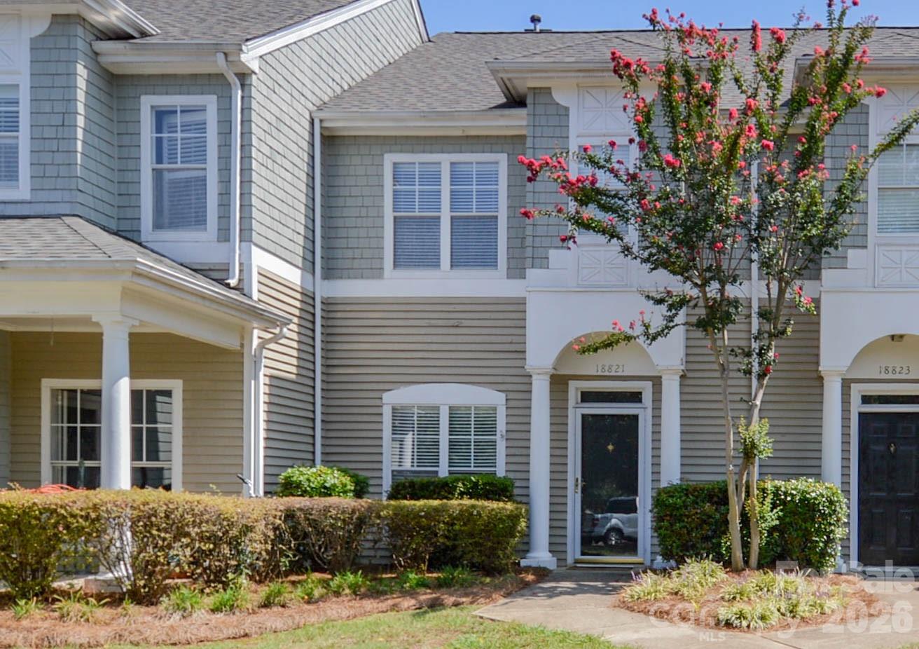 Welcome Home to Lake Norman Living! This charming, furnished townhome nestled in a small community adjoining beautiful Lake Norman. Move-in ready, this townhome offers a warm welcome from the moment you step inside. The front entrance opens to a lovely dining room with a pass through window to the Kitchen, perfect for serving and entertaining. The kitchen provides easy access to both dining and living areas, making gatherings effortless. Enjoy cozy evenings in the living area featuring built in shelving, a gas log fireplace and sliding doors leading to a private screened patio. Off the patio you will find a small grill included and a storage closet as well. Upstairs, you will find two comfortable bedrooms, each with it own private bath! Ideal set up for guest or roommates, The laundry is conveniently located between the bedrooms. Best of all, this townhome has it's own BOATSLIP! Enjoy direct access to Lake Norman. Please walk down to the water, you will find the private, gated pool area and picnic area with grill. There are also tennis courts for you. Great opportunity for lake lovers and located in desirable Cornelius. You will access to all the area's conveniences and be just minutes from I-77, Charlotte and Mooresville. Don't wait-Your Lake Norman lifestyle begins here!