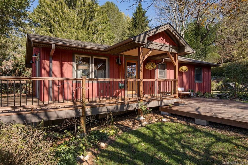 Completely renovated home in excellent location so close to Ingles, the Lumberyard district, and downtown.  Charming home with countless updates including new kitchen, baths, roof, siding, decking, HVAC (pending completion), master bedroom addition, and custom storage building.  You won't find better quality at this price. Deck overlooks open fields for a feeling of country living but with little yard maintenance and right in town.
