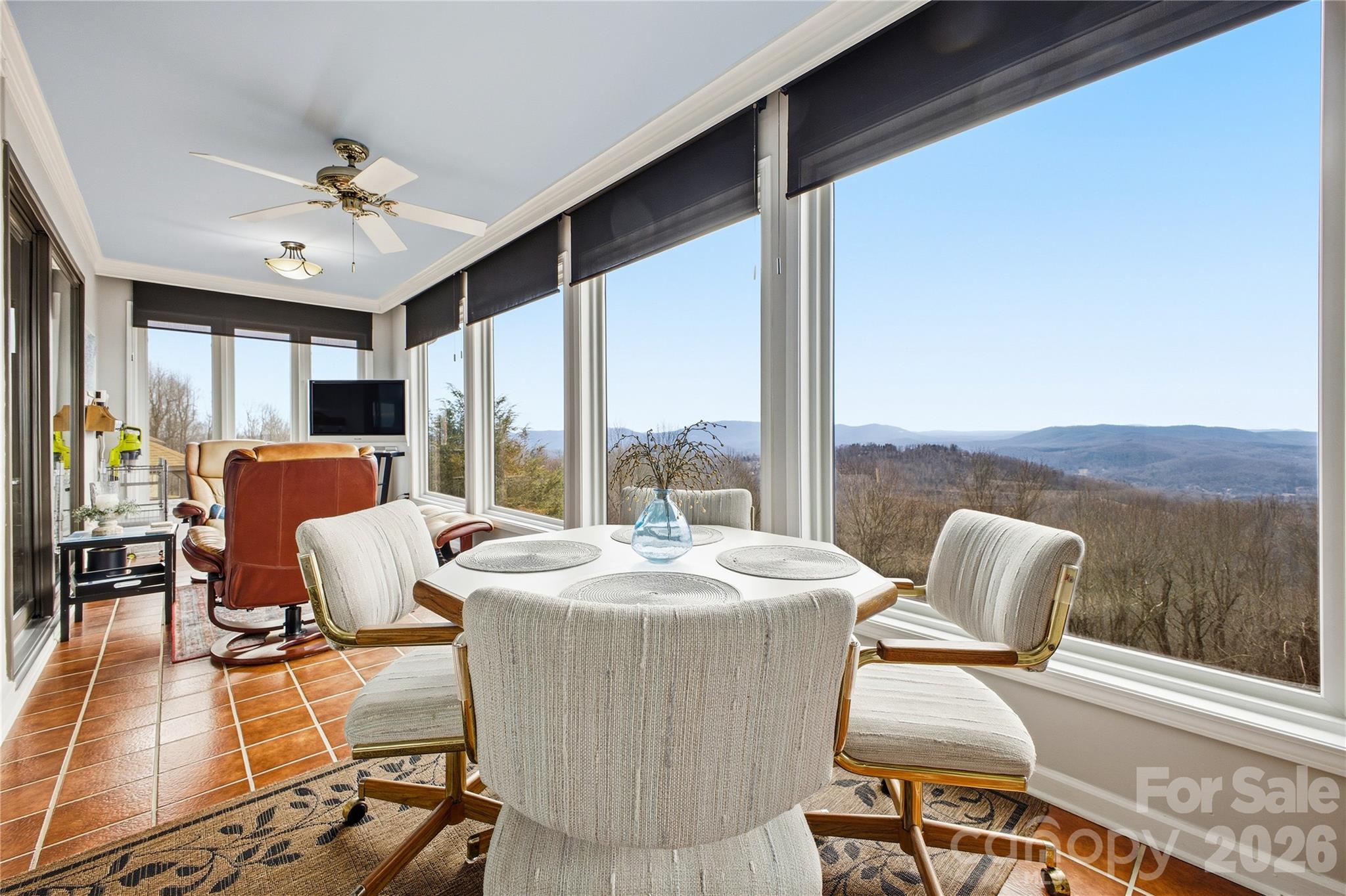 Wake up to sweeping mountain views from this exceptional 3-bedroom, 3-bath condo designed for comfort, space, and style. The home’s expansive sunroom is a true showstopper—wrapped in big mountain vistas and flooded with natural light, it’s perfect for relaxing, entertaining, or enjoying every season.

Inside, the living area is anchored by a dramatic floor-to-ceiling rock fireplace that adds warmth and character. Large bedrooms offer generous space and privacy, while the thoughtful layout provides excellent flow throughout. The lower level features outstanding storage, ideal for keeping everything organized without sacrificing living space.

With breathtaking views, oversized rooms, and rare features throughout, this condo lives large and offers the perfect mountain retreat or full-time residence.