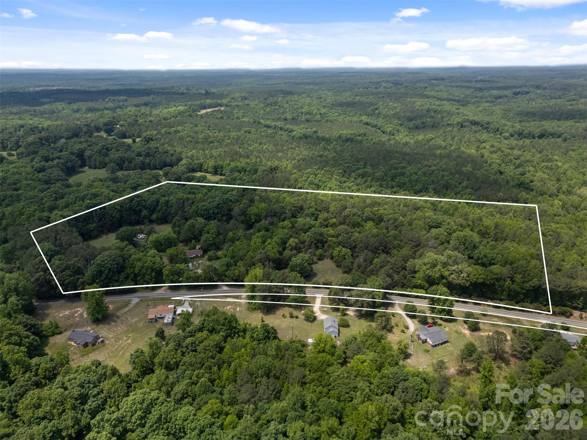 Endless possibilities on 21 acres in Chester. This unique property offers a rare opportunity for buyers seeking land, privacy, investment potential, recreational use, or future expansion in an area continuing to see growth and development.

The property includes a brick ranch home featuring approximately 1,716 heated square feet with 3 bedrooms, 1.5 bathroom, large living room, open kitchen and dining area, additional flex/entertainment room, and a roof replaced in 2022. The home is livable with opportunity for updates and improvements over time or tear down and rebuild.
The true value lies in the acreage and long-term potential this property offers. Whether you're looking to invest, build, homestead, or simply own a large tract of land, this property delivers opportunity and flexibility rarely found today.

Being sold as-is.