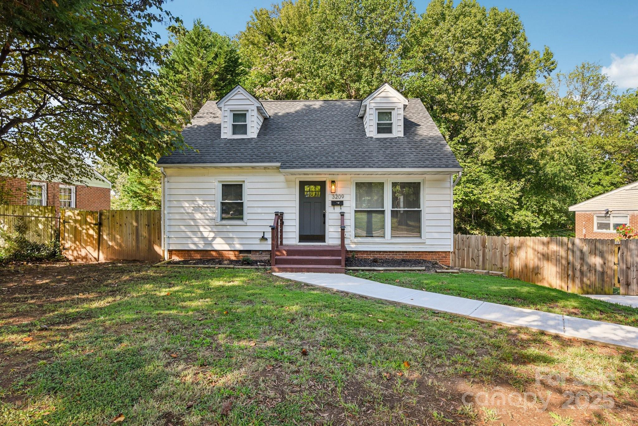 Step inside this beautifully renovated home in the heart of the 28205 corridor—where modern comfort meets prime location convenience. Every detail has been updated: from the sleek finishes throughout to the open, light-filled living areas that flow naturally. The kitchen is a standout, offering plenty of counter space and smart storage, while the bathrooms are refreshed and functional. The property sits on a generous lot- featuring a level, usable fenced yard—perfect for outdoor gatherings, gardening, or relaxing in private. With its prime location near shops, dining, and major thoroughfares, this home offers both lifestyle and value in a vibrant part of Charlotte. Don’t miss your chance—schedule your private tour today.