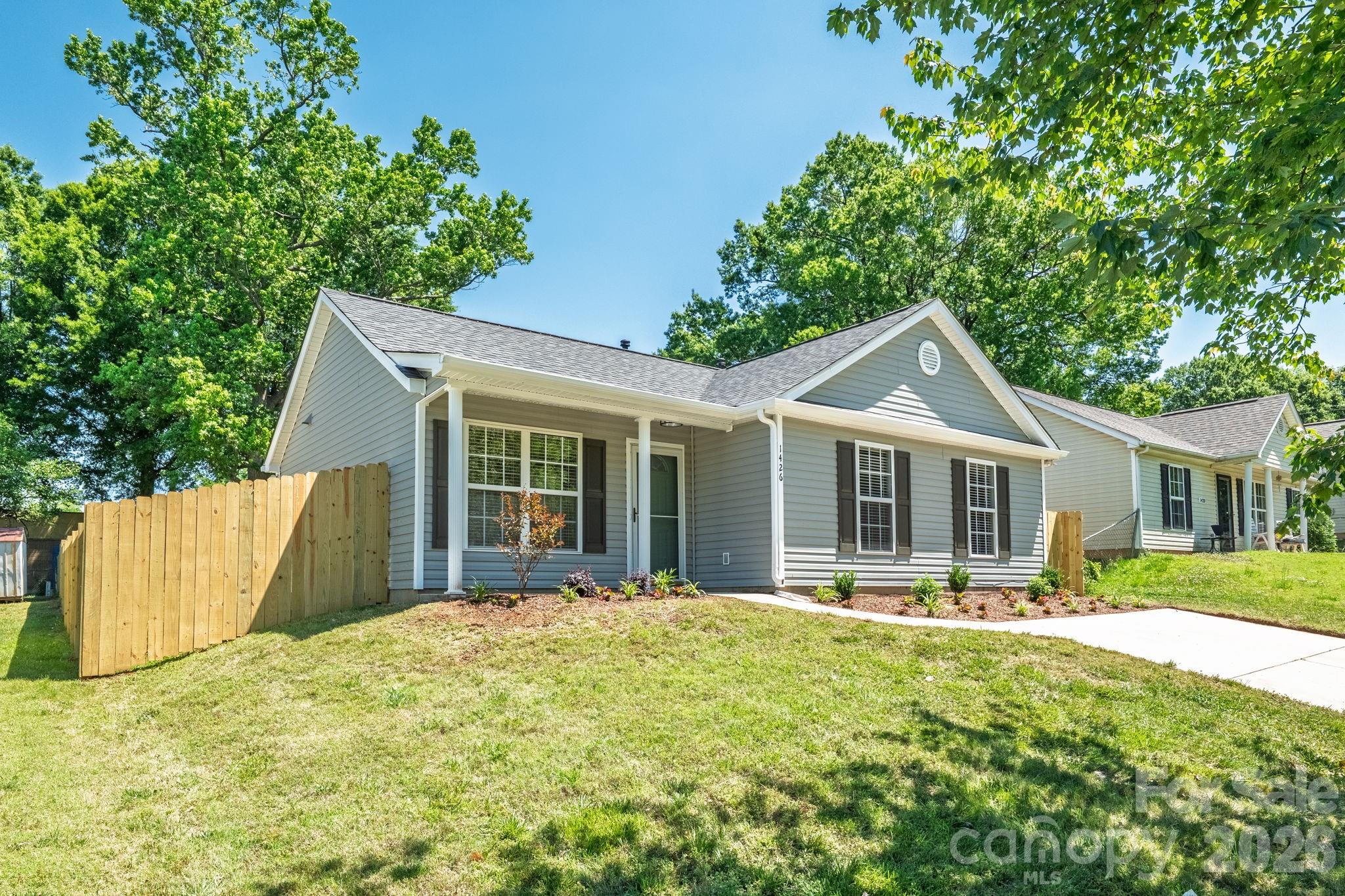 Buyer Incentive: Lower your monthly payment or bring less cash to closing! The seller is offering $8,500 towards a rate buy-down or closing costs with an acceptable offer. Welcome to 1426 Fontana Avenue — a fully renovated home offering the feel of luxury new construction while staying within budget, all while being minutes from some of Charlotte’s most popular dining, entertainment, and nightlife destinations. Thoughtfully updated throughout, this home features leveled floors, LVP flooring with whisper pad underlayment, recessed lighting, fresh interior and exterior paint, and a beautifully redesigned kitchen with quartz countertops, tile backsplash, vented microwave, Samsung appliances, and updated cabinetry. The bathrooms are true showstoppers, featuring all-new showers and beautiful vanities that bring a luxury-home feel to the space. Major upgrades, including a new roof with a 1-year labor warranty, HVAC replaced in 2021, and furnace replaced in 2022, provide added peace of mind. Outside, enjoy a fully fenced backyard with a 6-foot privacy fence—perfect for relaxing, entertaining, or pets. Located just minutes from Camp North End, NoDa, Plaza Midwood, the AvidXchange Music Factory, and countless local coffee shops, restaurants, and entertainment options, this move-in-ready home offers modern living in the heart of Charlotte.