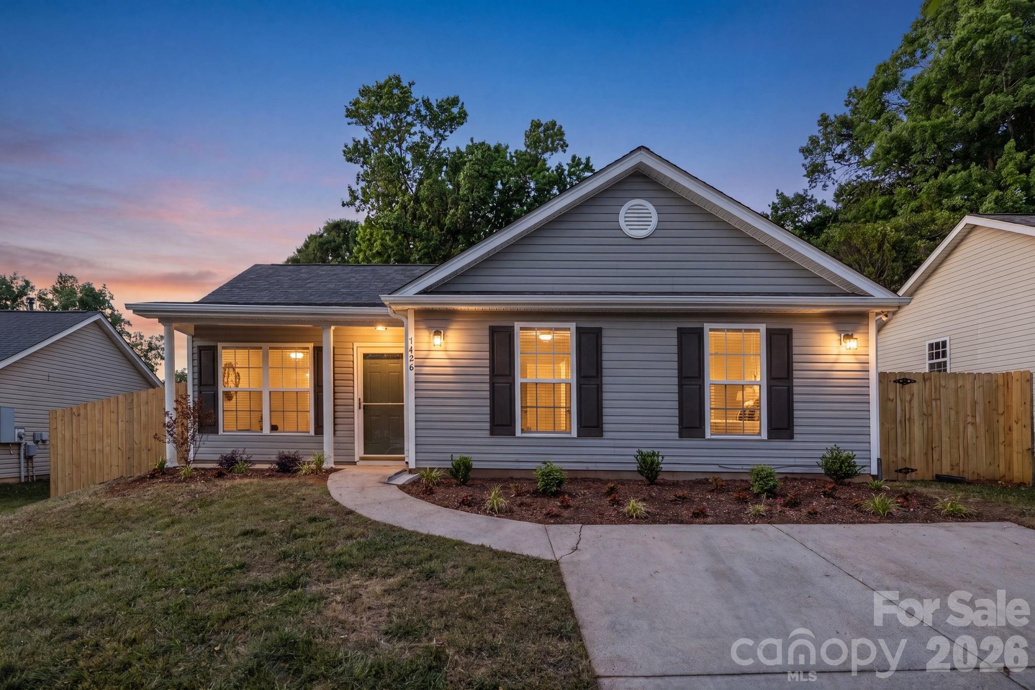 Minutes from Camp North End, NoDa, Plaza Midwood, and the AvidXchange Music Factory sits 1426 Fontana Avenue—a fully renovated home that delivers the feel of luxury new construction without the luxury price tag.
Thoughtfully updated throughout, this home features LVP flooring with whisper pad underlayment, recessed lighting, fresh interior and exterior paint, and a beautifully redesigned kitchen with quartz countertops, a beautiful tile backsplash, vented microwave, Samsung appliances, and updated cabinetry with a soft-close feature. The bathrooms are true showstoppers, featuring all-new showers and beautiful vanities that bring a luxury-home feel to the space.

Major upgrades — including a new roof installed in 2026 with a 1-year labor warranty, HVAC replaced in 2021, and furnace replaced in 2022 — provide added peace of mind. Outside, enjoy a fully fenced backyard with a 6-foot privacy fence, perfect for relaxing, entertaining, or pets.

Move-in-ready and centrally located, this home puts modern living in the heart of Charlotte within easy reach — and with its walkable proximity to some of the city's top destinations, it also presents strong potential as a short-term rental for the right buyer.