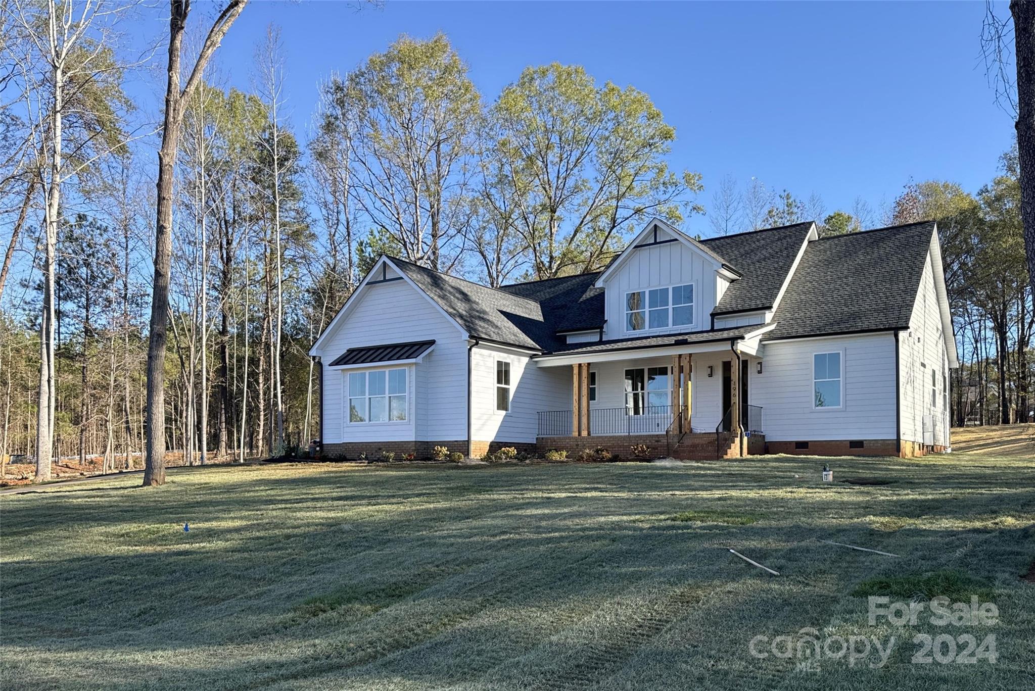 This stunning new construction by Waddell Custom Homes offers everything you’ve been dreaming of in your next home. With 4 spacious bedrooms and 3.5 beautifully designed bathrooms, this thoughtfully crafted cottage blends charm, comfort, and modern functionality.  Enjoy cozy evenings by the fireplace or unwind on the inviting screened porch, perfect for relaxing or entertaining year-round. The open-concept kitchen, living, and dining areas are ideal for hosting family and friends in style. A charming front porch, a two-car garage, and a picturesque elevation complete the exterior of this gorgeous home. Nestled on a generous 1.018-acre lot in the serene Heartland Acres community, you’ll love the peace and privacy this location offers, while still enjoying convenient access to Rock Hill and York. Make the Waterbury Cottage your sanctuary—schedule your showing today! ***Temporary Rate Buy Down Approved On This Property With A Full Price Offer through a trusted local lender!***