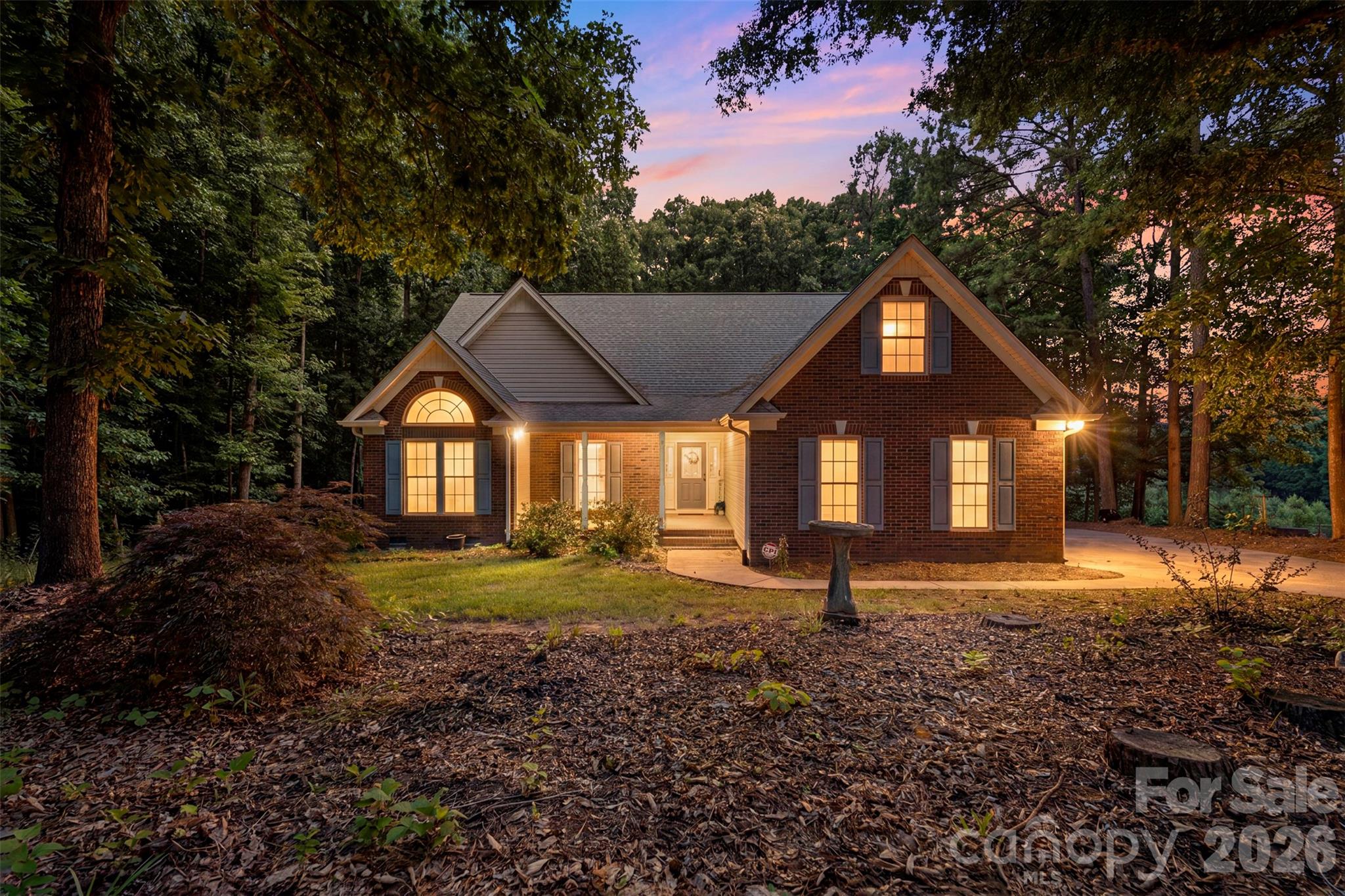 Nestled on a private wooded lot, this beautifully updated home offers comfort, privacy, and peace of mind with numerous recent improvements. Originally a 4-bedroom home, one bedroom was thoughtfully incorporated into the primary suite to create a spacious walk-in closet, expanded ensuite bath, and convenient laundry area. Recent updates include a new roof (2024), HVAC (2025), tankless water heater (2024), well pump and bladder tank (2023), deck and stairs (2025), and newer LVP flooring. The kitchen features granite countertops, a custom pantry by Closet By Design, and newer appliances. Refrigerator, washer, and dryer convey. Enjoy the warmth of the gas fireplace, mature trees, and the tranquility of this exceptional setting.