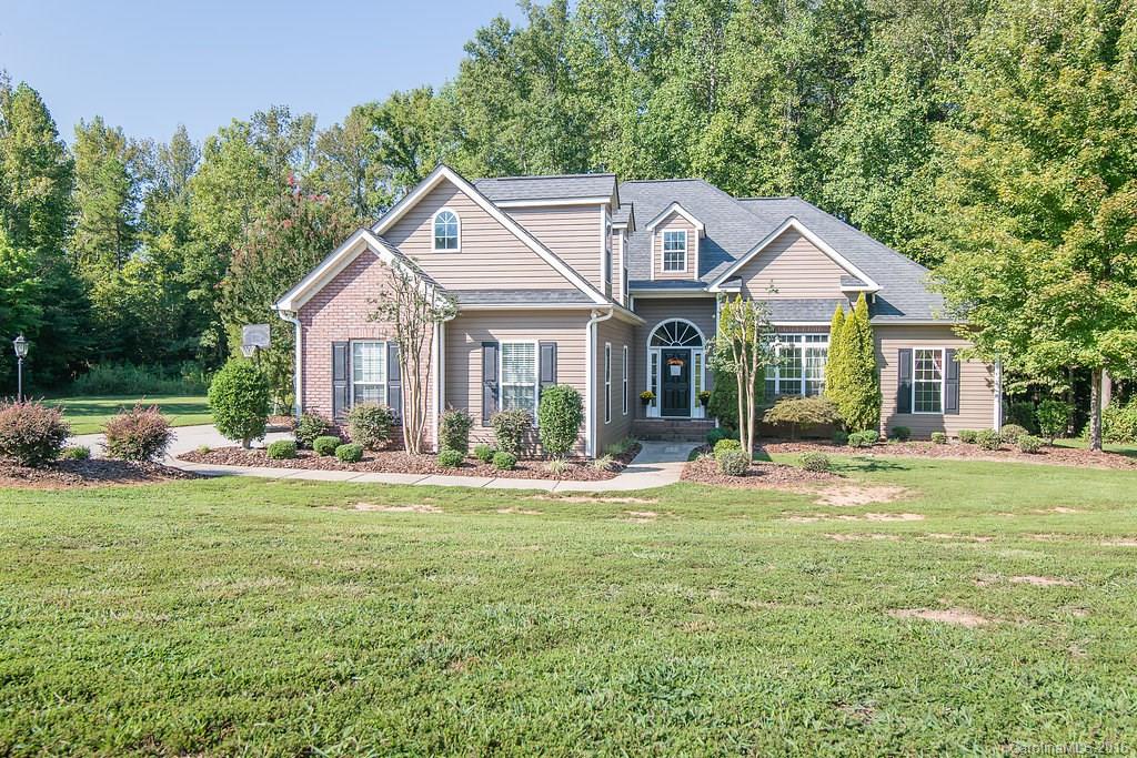 Beautiful, well kept home minutes from I-77! Sit on the screened porch and enjoy the large, private, 1.4 acre lot in this quiet country neighborhood. Home boasts granite counter tops, pre-treated wood floors, central vac, tiled shower/ floors and much more! This one is a must see!
