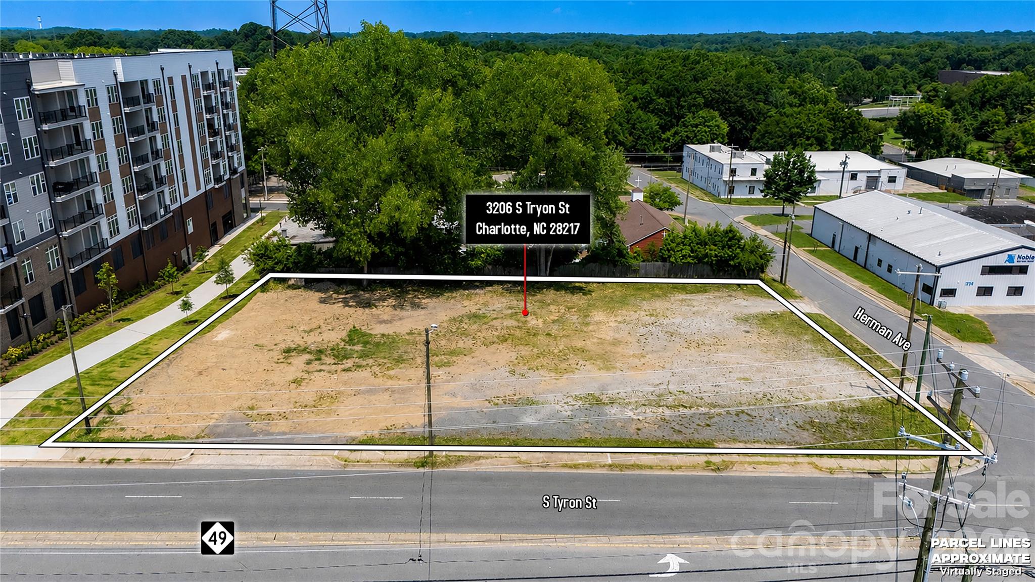 Prime Infill Corner Lot just two miles south of the Uptown skyline. A rare commercial opportunity awaits at the bustling corner of South Tryon Street and Herman Avenue. This exceptional 0.63-acre parcel boasts an impressive 47 feet of frontage along the heavily trafficked South Tryon corridor and an additional 43 feet on Herman Avenue, capturing the attention of over 20,000 daily passersby and delivering the kind of visibility that can make or break a retail, hospitality, or mixed-use venture. Currently zoned for light industrial use, this property is a blank canvas for visionary developers, as the City of Charlotte has already signaled a strong openness to rezoning for higher-density multifamily, mixed-use, retail, office, or hospitality projects, complete with reduced parking requirements to maximize your buildable area and return on investment. The numbers here tell a compelling story of momentum, with the surrounding trade area projecting a robust12% population and income growth through 2030, fueled by a high-earning household base that is hungry for new development. Adding to the strategic advantage, the property sits just eight hundred yards from the Newburn Light Rail Station, making it a prime candidate for transit-oriented design that aligns perfectly with Charlotte’s 2040 growth vision. For developers looking to secure one of the very few remaining commercial lots this close to the city’s core, the seller is offering flexible terms, including the option to handle the rezoning process for you and attractive seller financing with just fifty percent down, making this not just an acquisition, but a streamlined path to building something extraordinary in one of the Southeast’s fastest-growing markets!