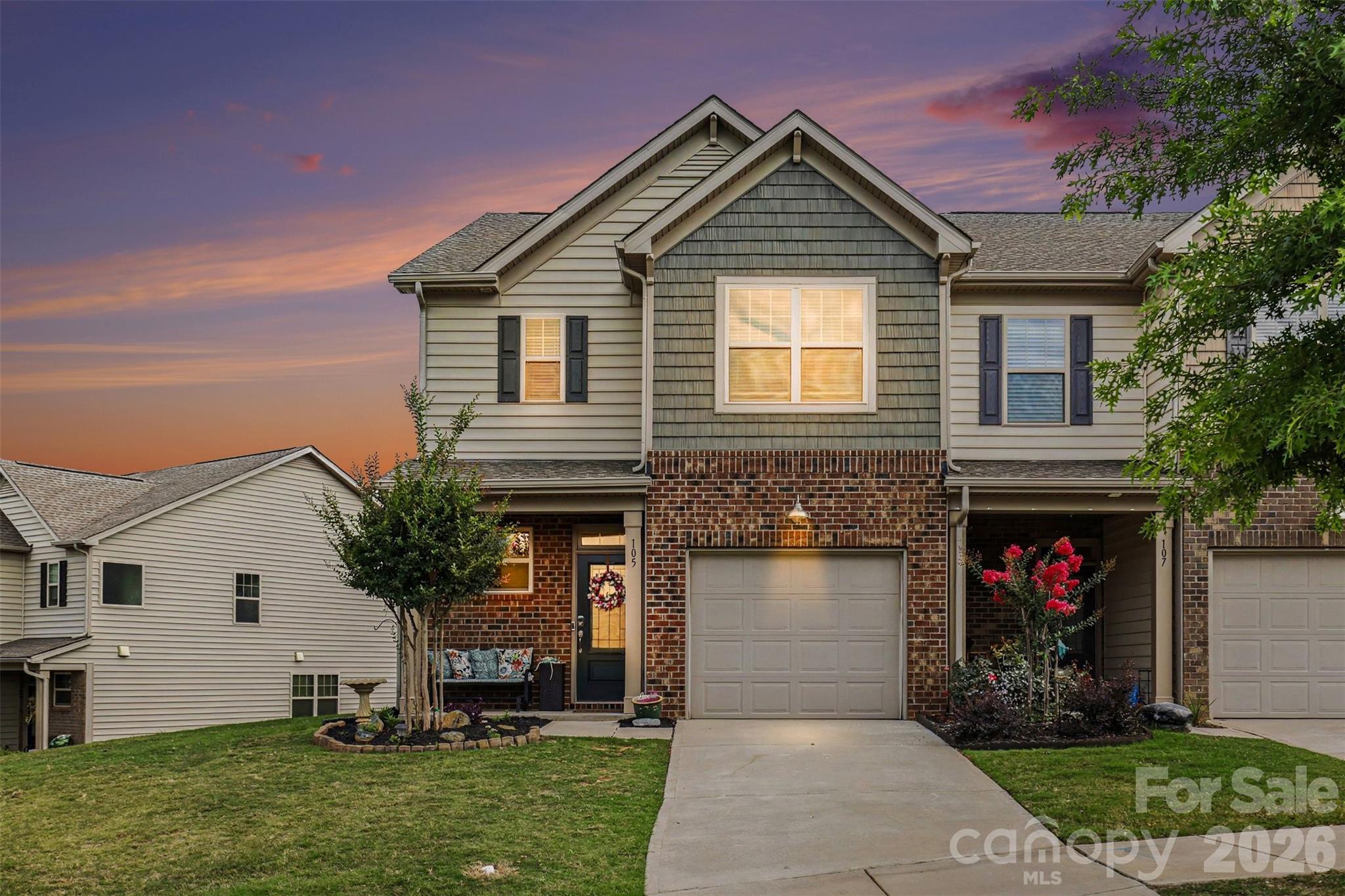 Stand out from the crowd with this pristine END-UNIT townhome in Fort Mill! Enjoy new carpet, freshly painted walls, extra windows, maximum natural light, and enhanced privacy in the gorgeous Waterside at the Catawba community. Built by Lennar in 2019, this beautifully maintained 3-bed, 2.5-bath home features an open-concept main floor with seamless vinyl plank flooring, a gas fireplace, and an attached one-car garage. Upstairs boasts a spacious primary suite plus two bright guest bedrooms. Step outside to your private rear porch or take advantage of resort-style living with walking trails, a fitness center, pool, and playgrounds. Zoned for award-winning Fort Mill schools and minutes from dining and shopping—this one won't last long in a crowded market!